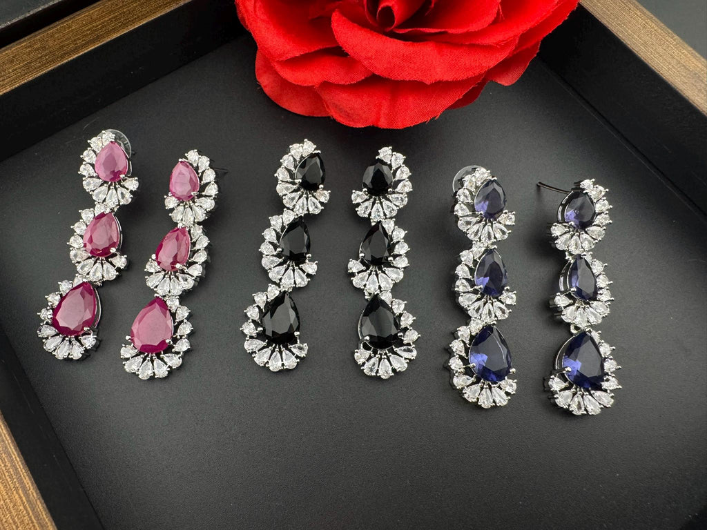 Premium Cubic Zirconia and Crystal stone in silver color Statement Long earrings