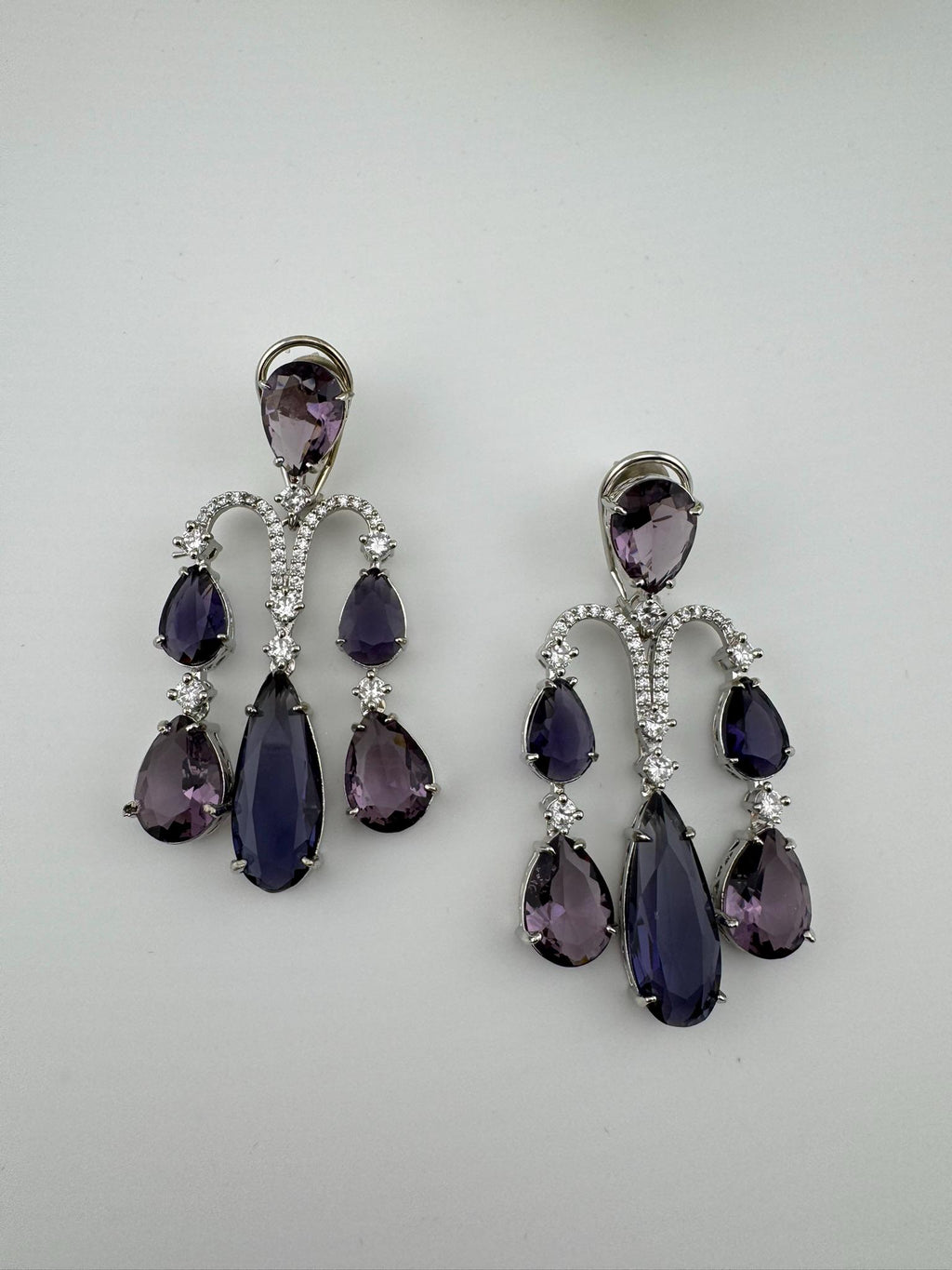 Premium Cubic Zirconia and glass stone in silver color is designer Inspired Statement Long earrings