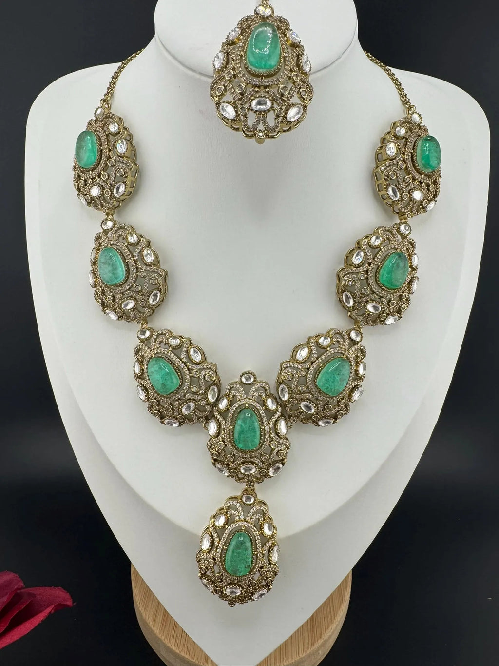 Premium Quality in Moissanite, uncut Kundan, CZ, Doublet stones in matt gold is Designer inspired fusion Necklace with Stud earring & Tikka