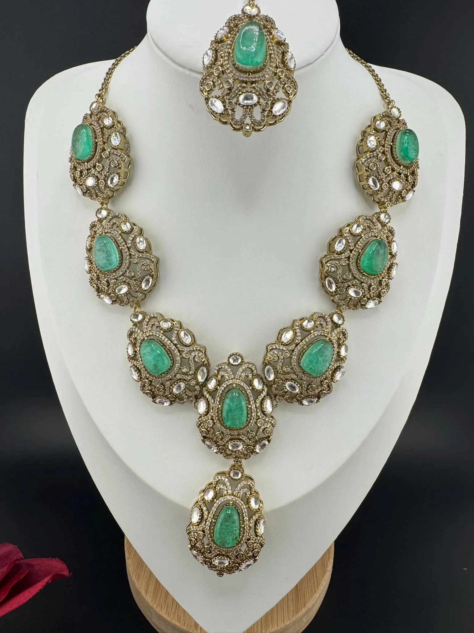 Premium Quality in Moissanite, uncut Kundan, CZ, Doublet stones in matt gold is Designer inspired fusion Necklace with Stud earring & Tikka