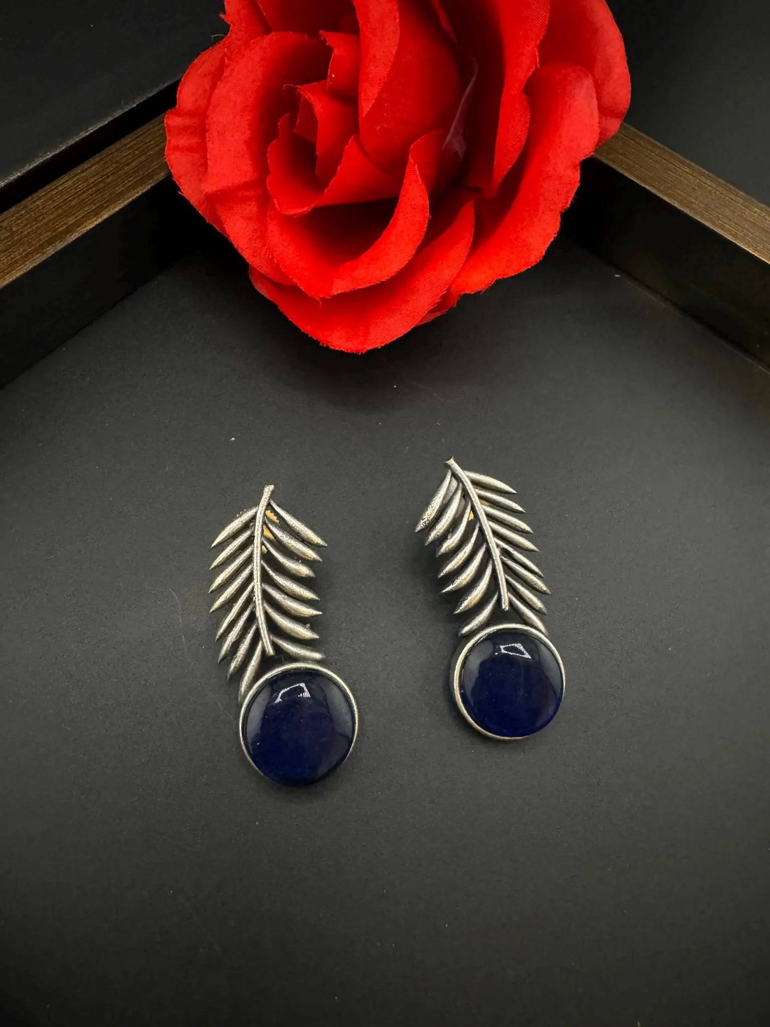 Oxidized German silver leaf pattern Stud earrings with Monalisa stone