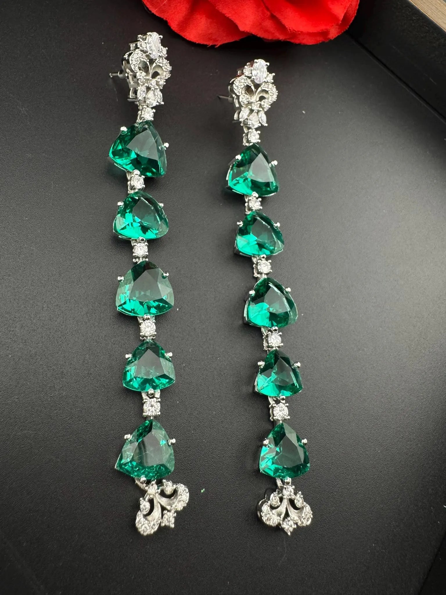 Premium Cubic Zirconia and glass stone in silver color is designer Inspired Statement Long earrings
