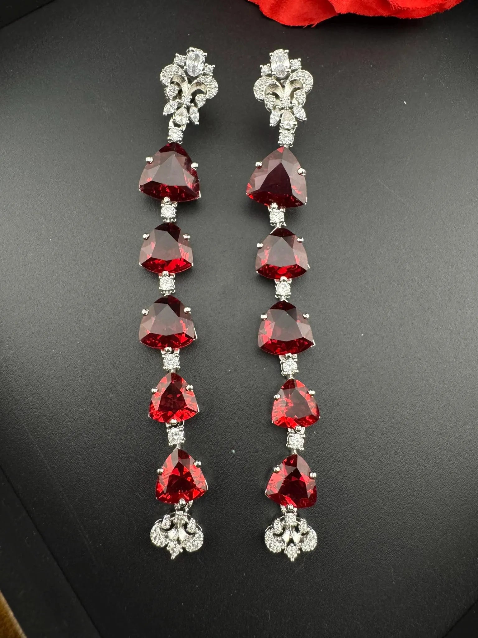 Premium Cubic Zirconia and glass stone in silver color is designer Inspired Statement Long earrings