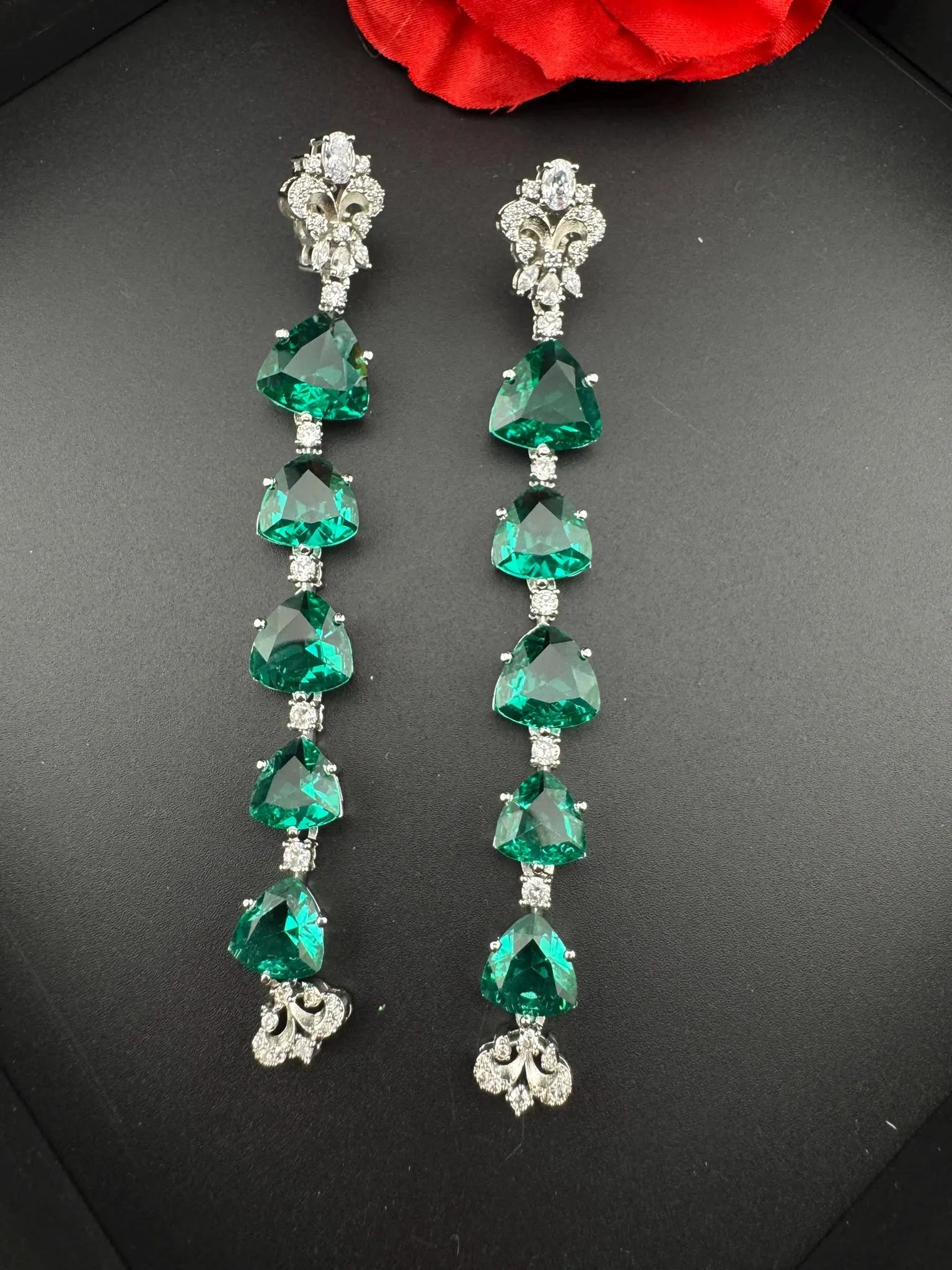 Premium Cubic Zirconia and glass stone in silver color is designer Inspired Statement Long earrings