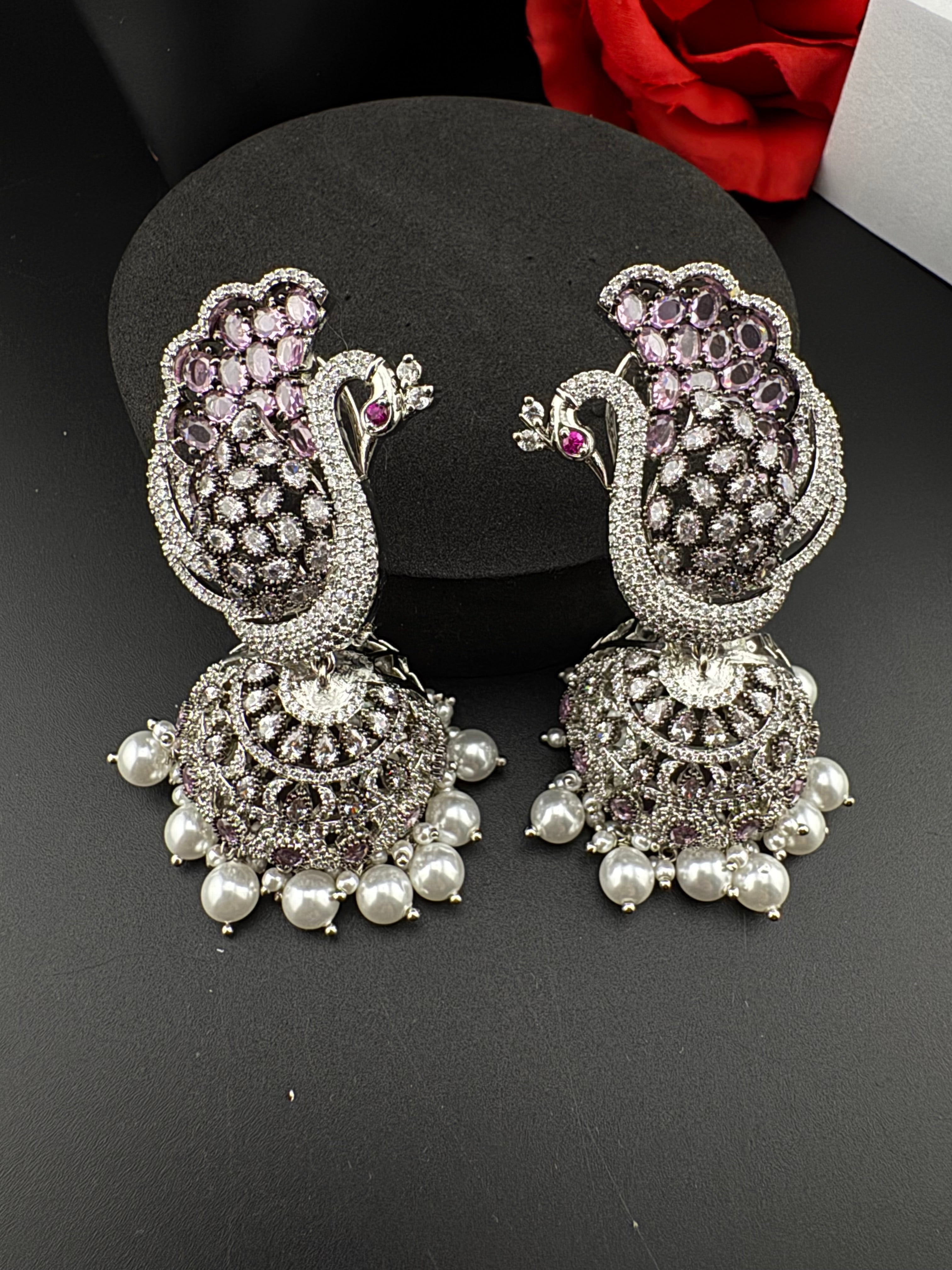 Premium Cubic Zirconia Peacock jhumka earrings is designer Inspired, Statement Long earring, Bridal, Party, Wedding jewelry, chic, Indian