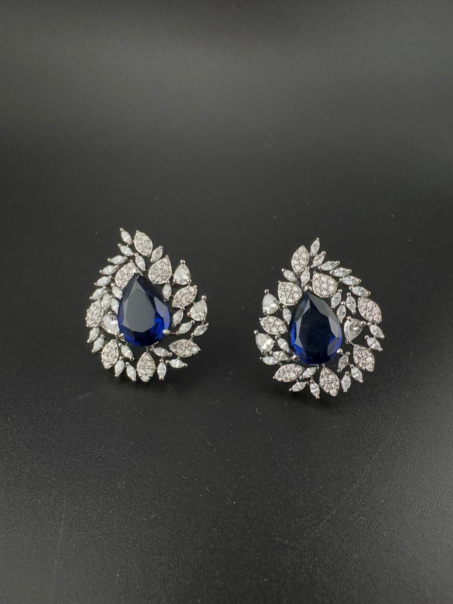 Premium Nano Setting Cubic Zirconia, Crystal stones in Unique setting is designer Inspired Statement Stud earrings