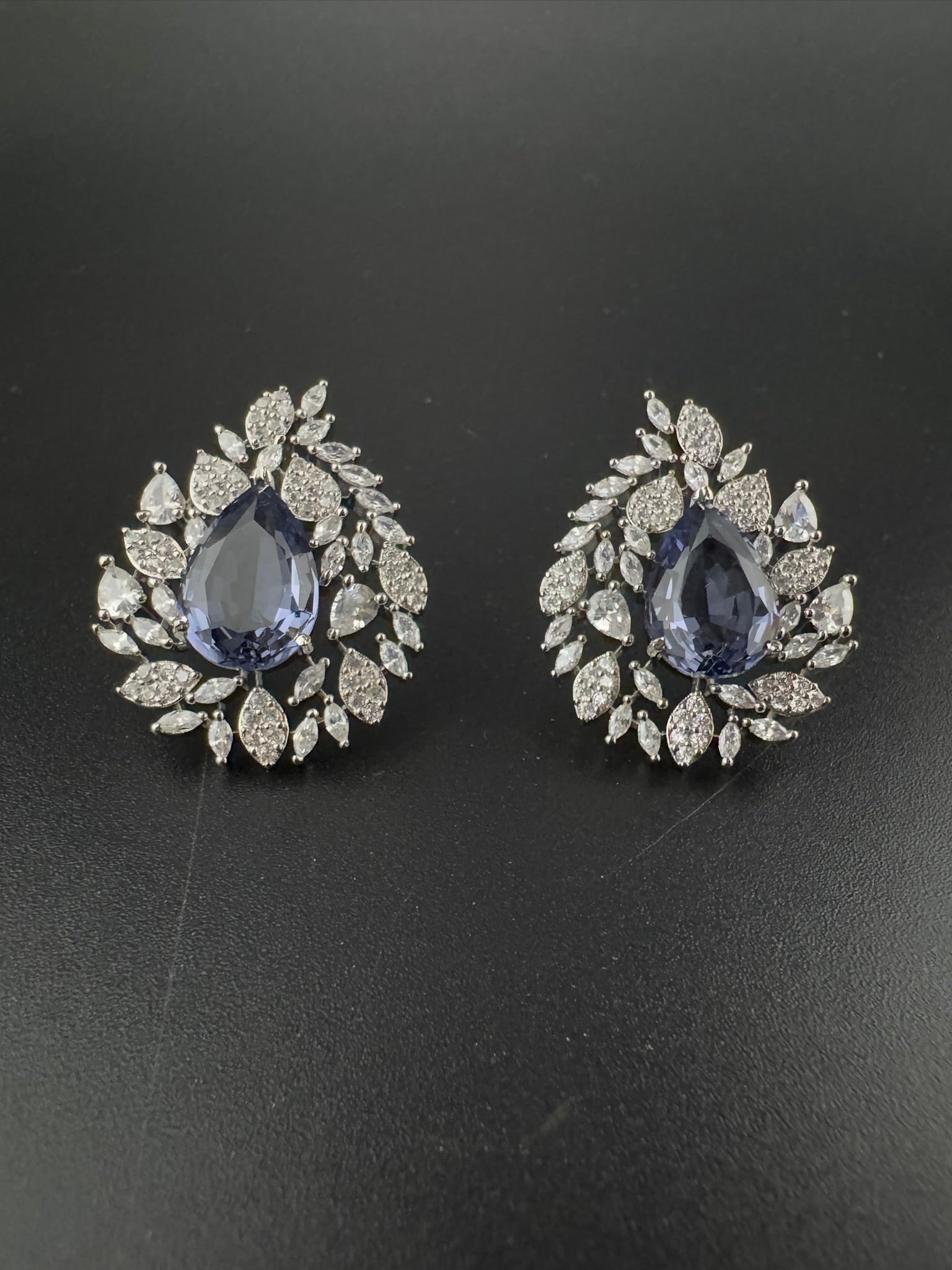 Premium Nano Setting Cubic Zirconia, Crystal stones in Unique setting is designer Inspired Statement Stud earrings