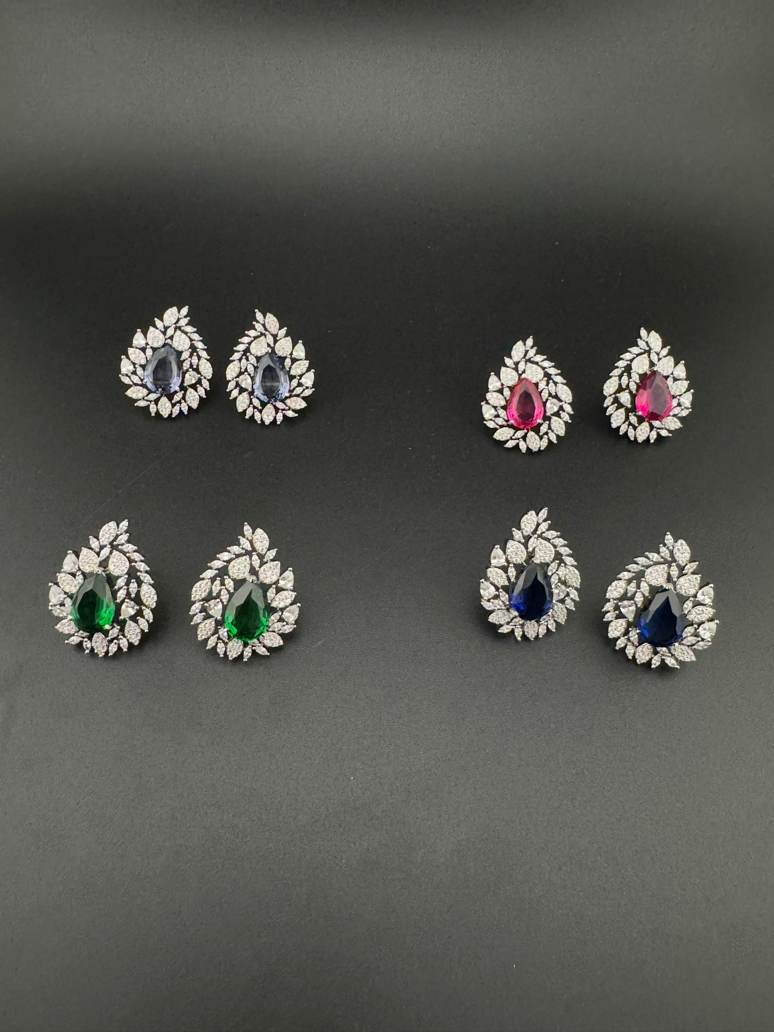 Premium Nano Setting Cubic Zirconia, Crystal stones in Unique setting is designer Inspired Statement Stud earrings
