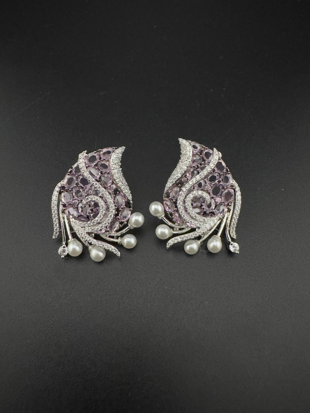 Premium Nano Setting Cubic Zirconia, Crystal stones in Unique setting is designer Inspired Statement Silver colored Stud earrings