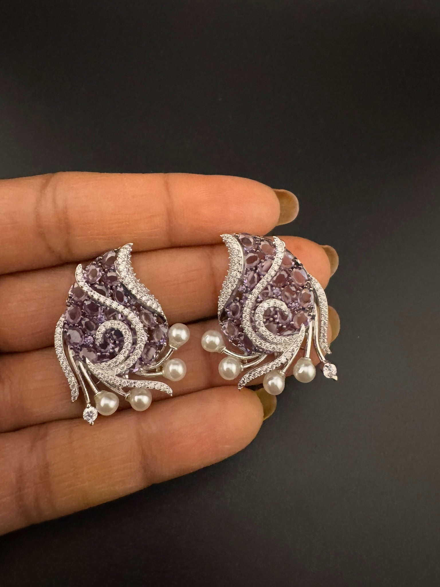 Premium Nano Setting Cubic Zirconia, Crystal stones in Unique setting is designer Inspired Statement Silver colored Stud earrings