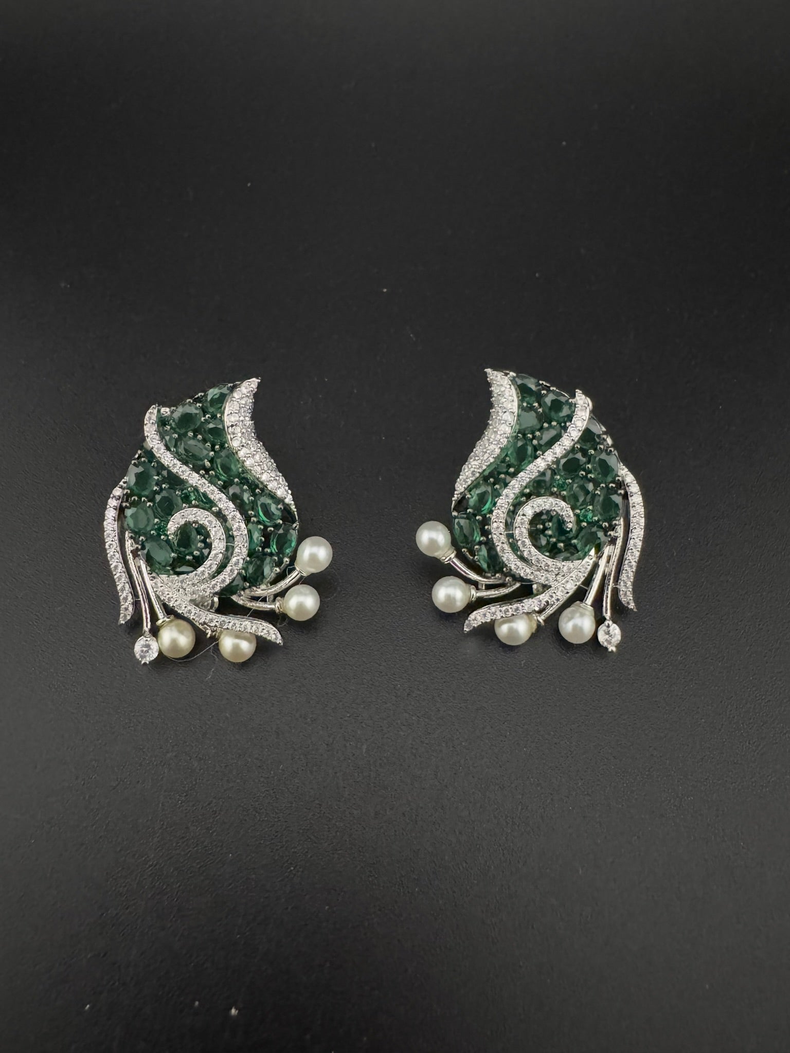 Premium Nano Setting Cubic Zirconia, Crystal stones in Unique setting is designer Inspired Statement Silver colored Stud earrings