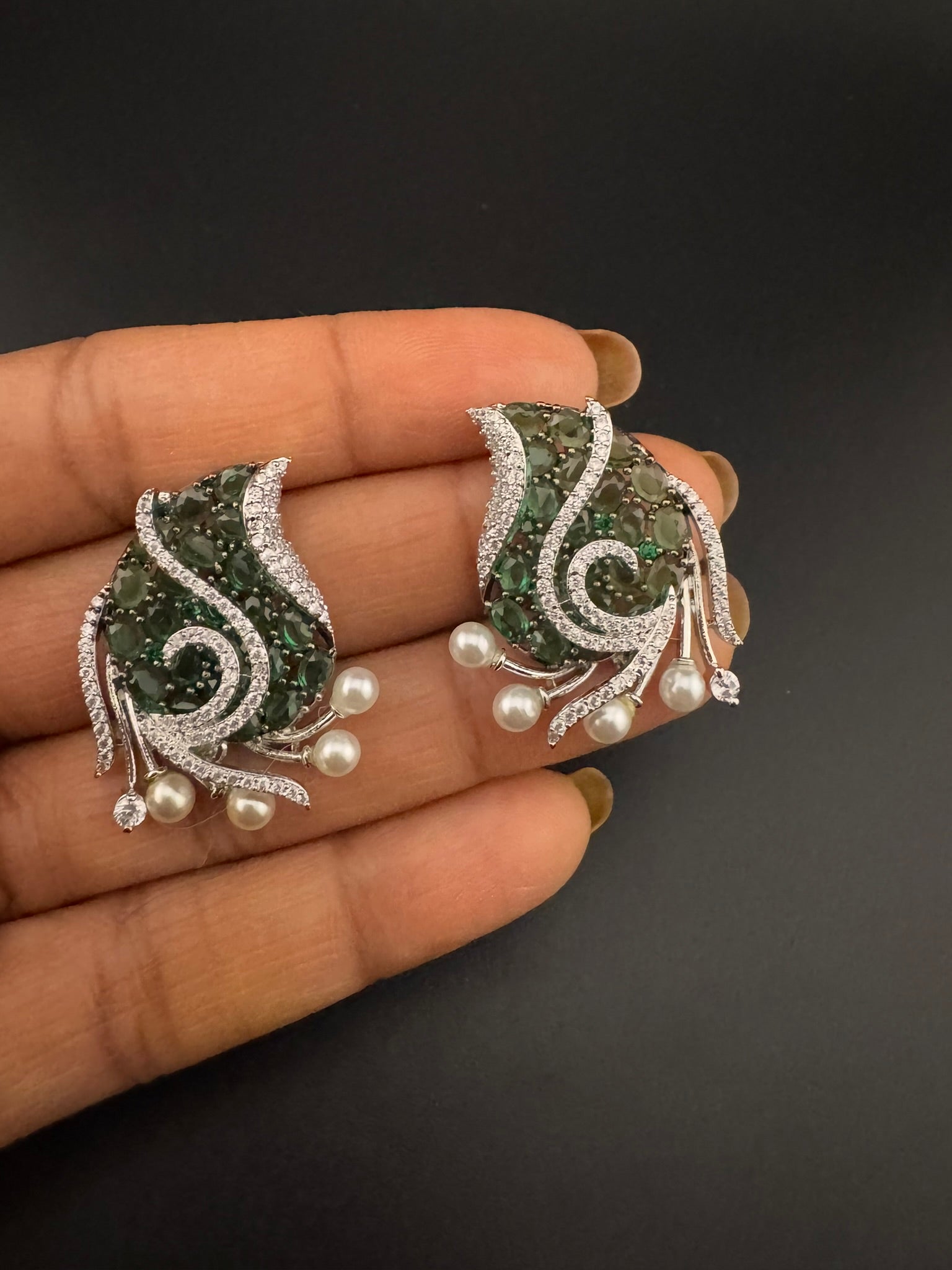 Premium Nano Setting Cubic Zirconia, Crystal stones in Unique setting is designer Inspired Statement Silver colored Stud earrings