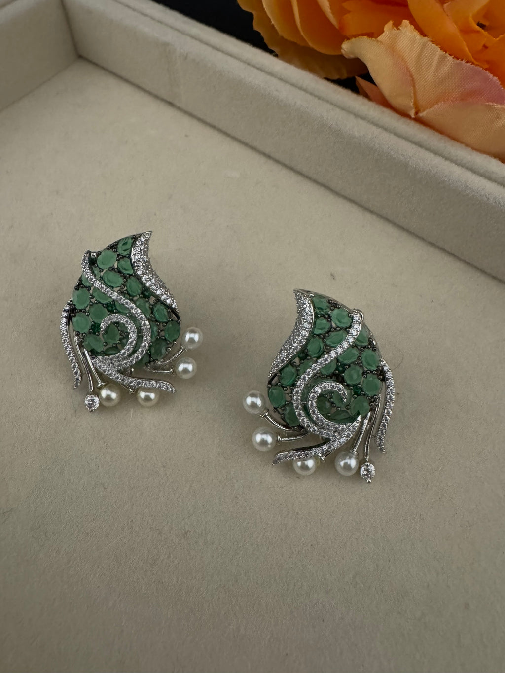 Premium Nano Setting Cubic Zirconia, Crystal stones in Unique setting is designer Inspired Statement Silver colored Stud earrings