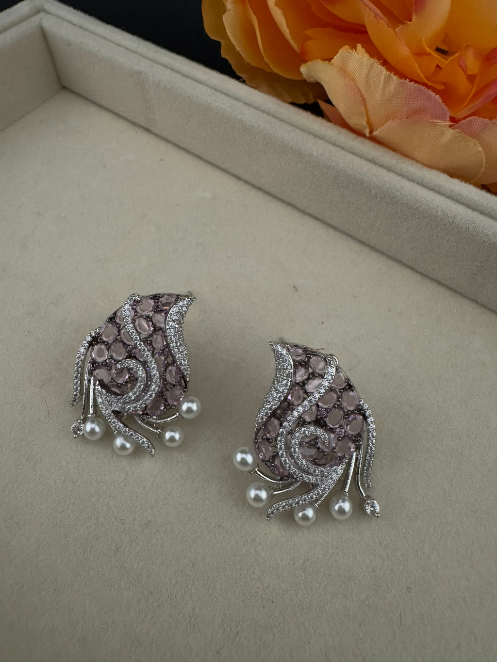 Premium Nano Setting Cubic Zirconia, Crystal stones in Unique setting is designer Inspired Statement Silver colored Stud earrings