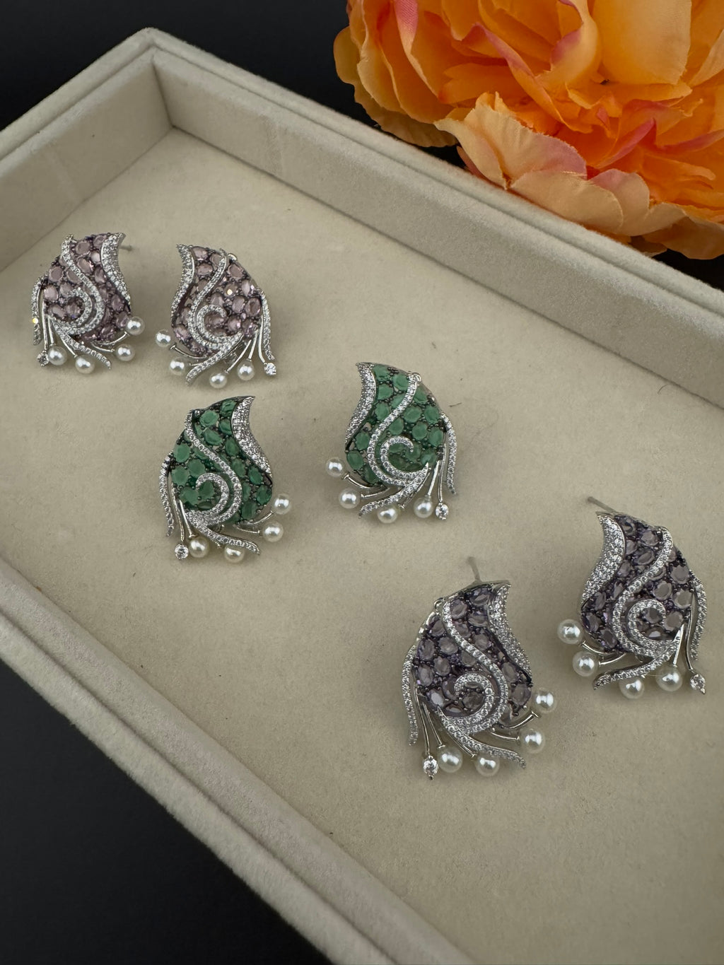 Premium Nano Setting Cubic Zirconia, Crystal stones in Unique setting is designer Inspired Statement Silver colored Stud earrings