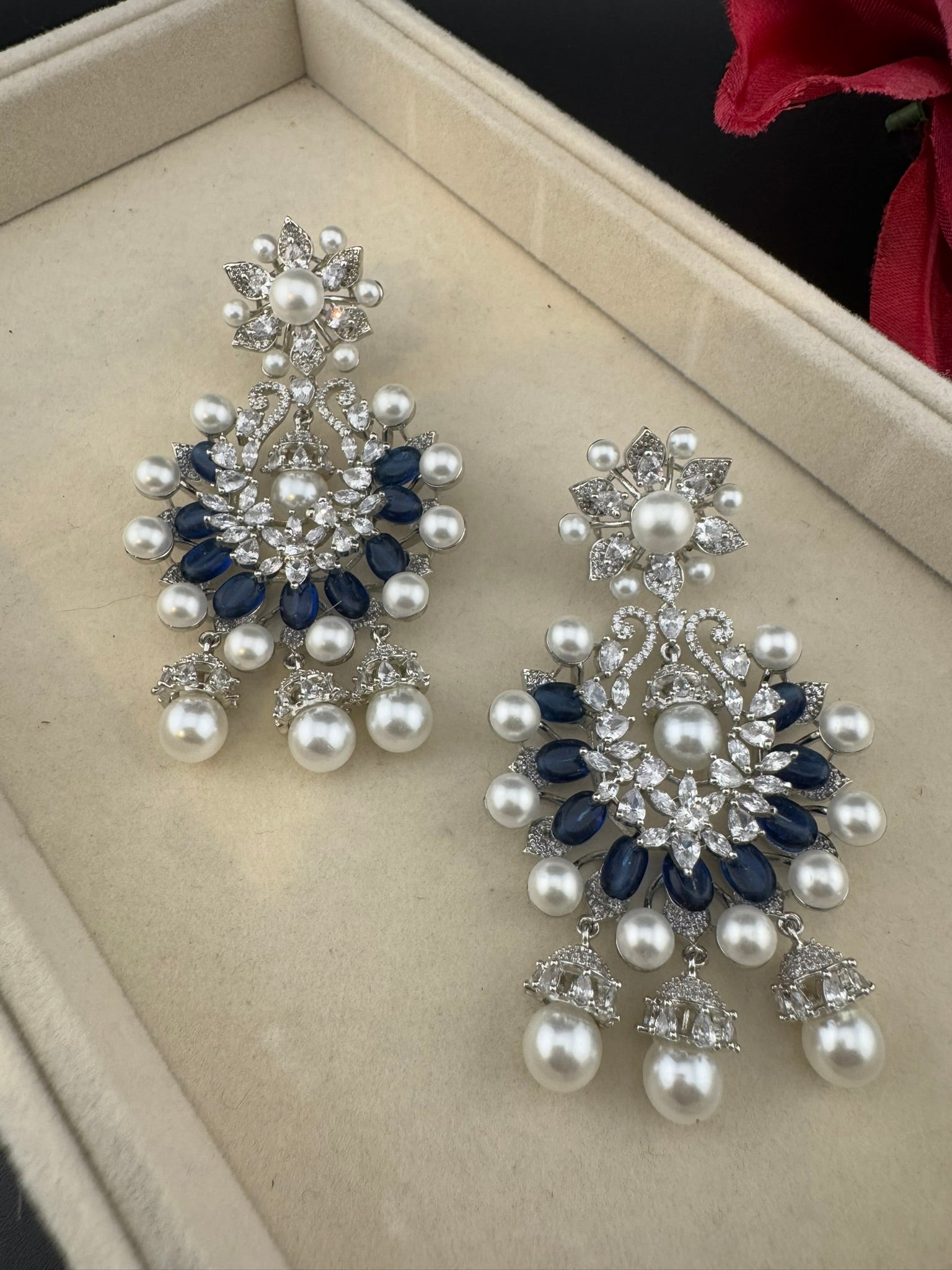 Premium Nano Setting Cubic Zirconia with Blue stones and Pearls is designer Inspired Statement Drop Dangle Long Chandbali earring