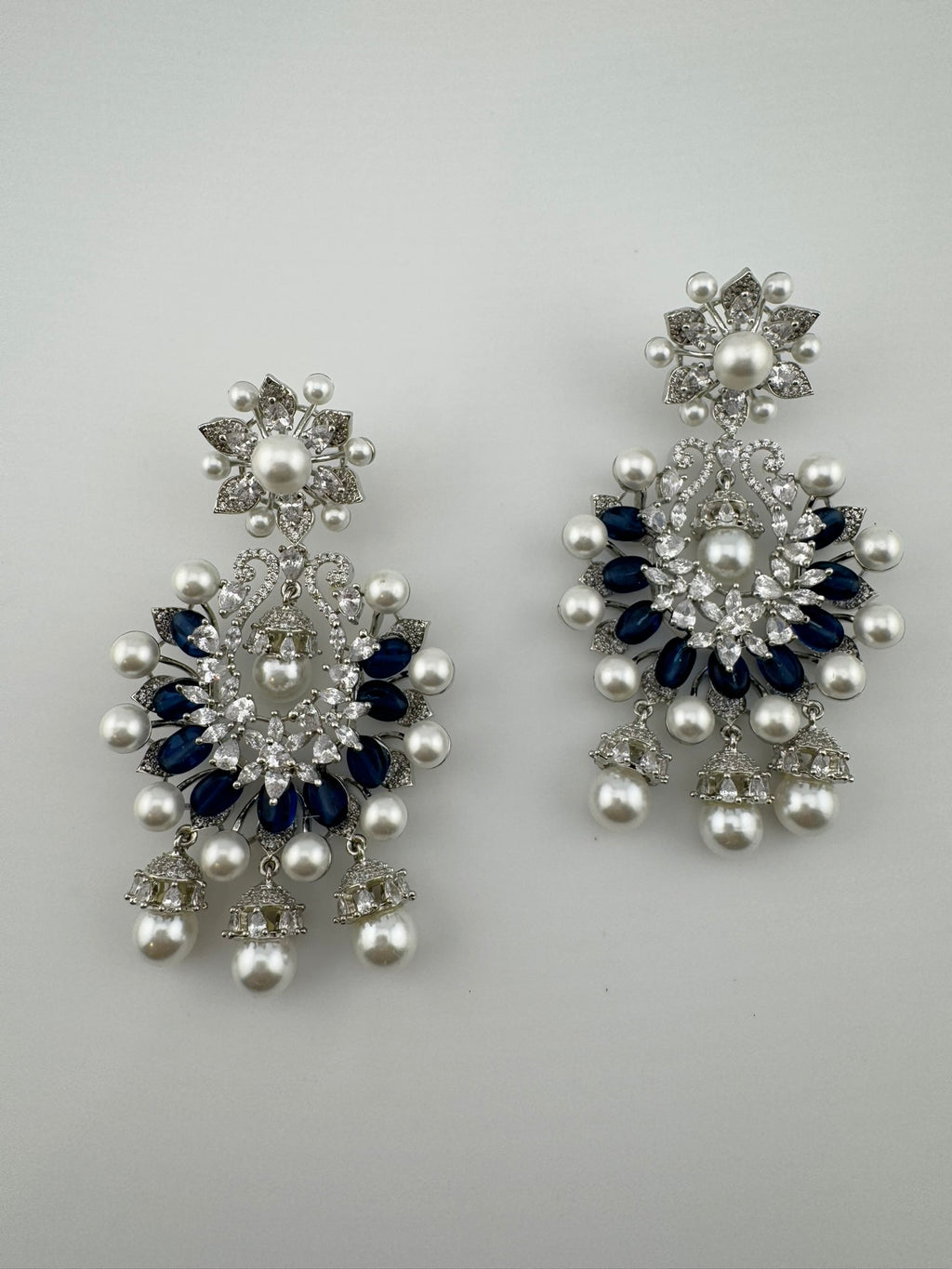 Premium Nano Setting Cubic Zirconia with Blue stones and Pearls is designer Inspired Statement Drop Dangle Long Chandbali earring