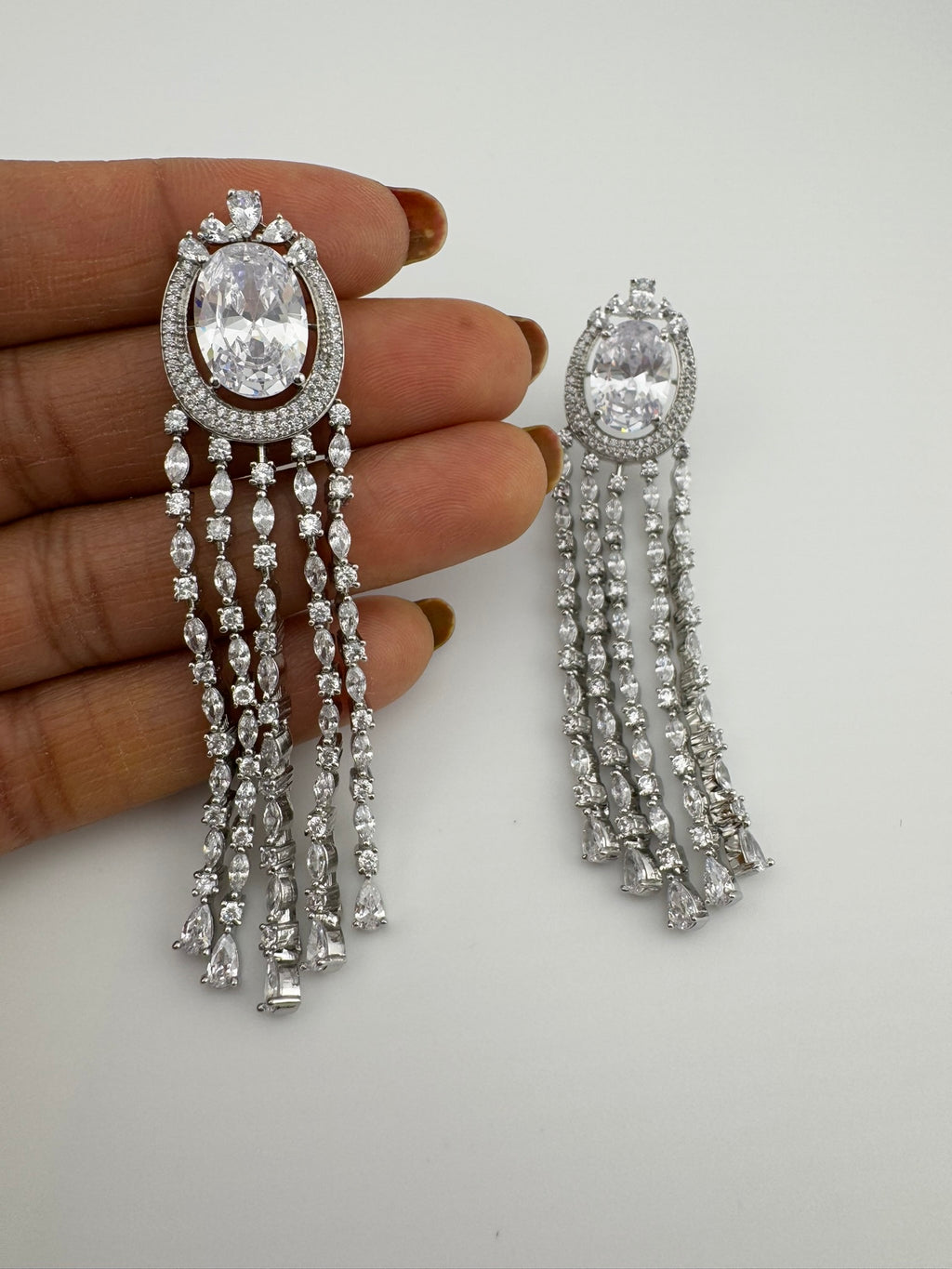 Premium silver color Cubic Zirconia long tassel earrings, high shine