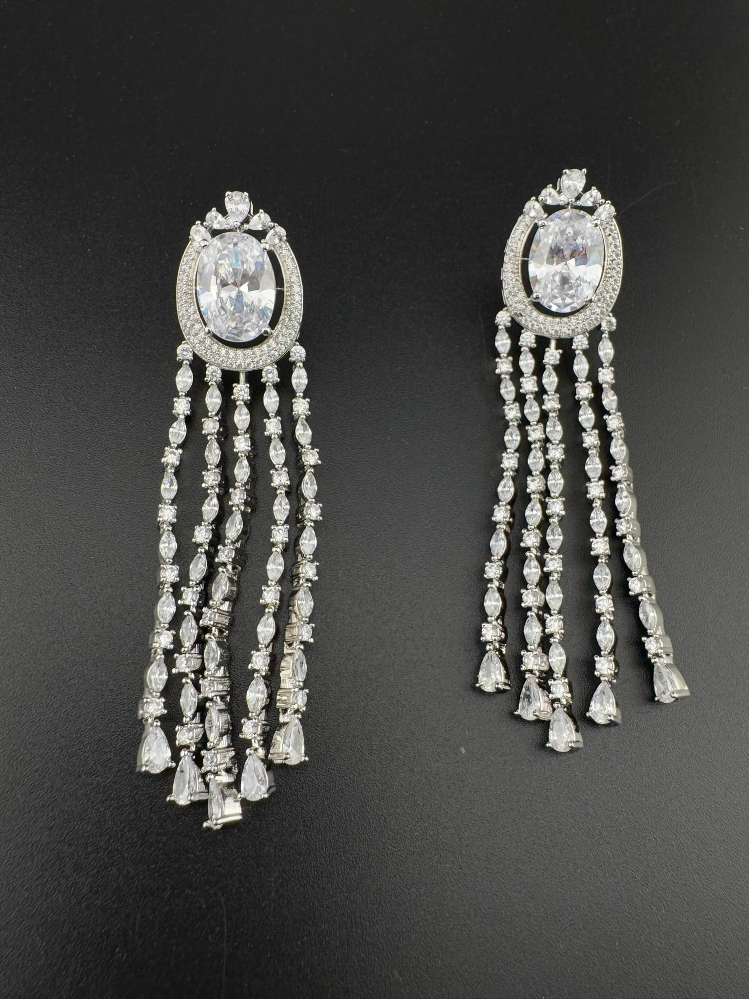 Premium silver color Cubic Zirconia long tassel earrings, high shine