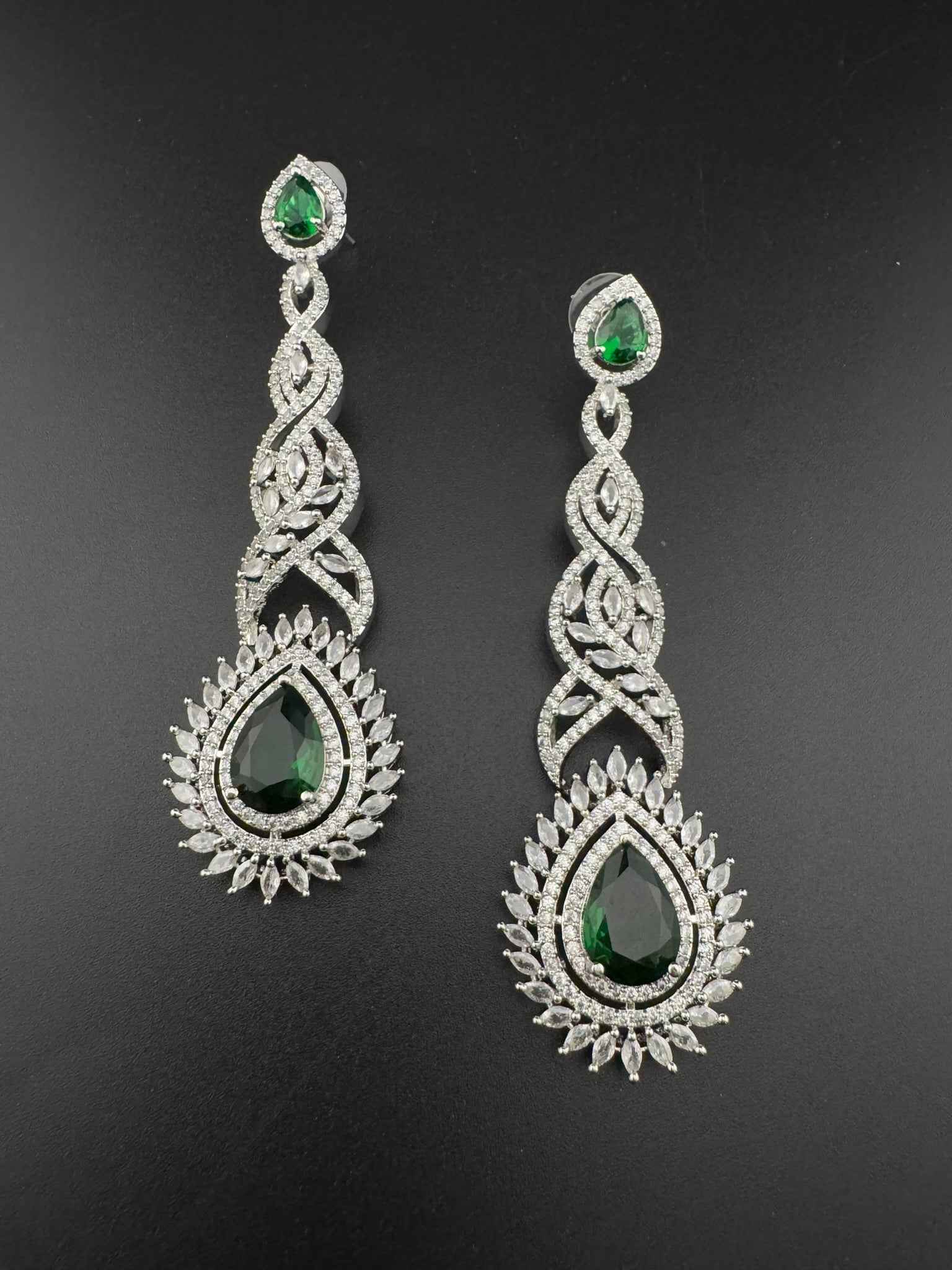 Premium Cubic Zirconia and Crystal stone in silver color is designer Inspired Statement Long earrings