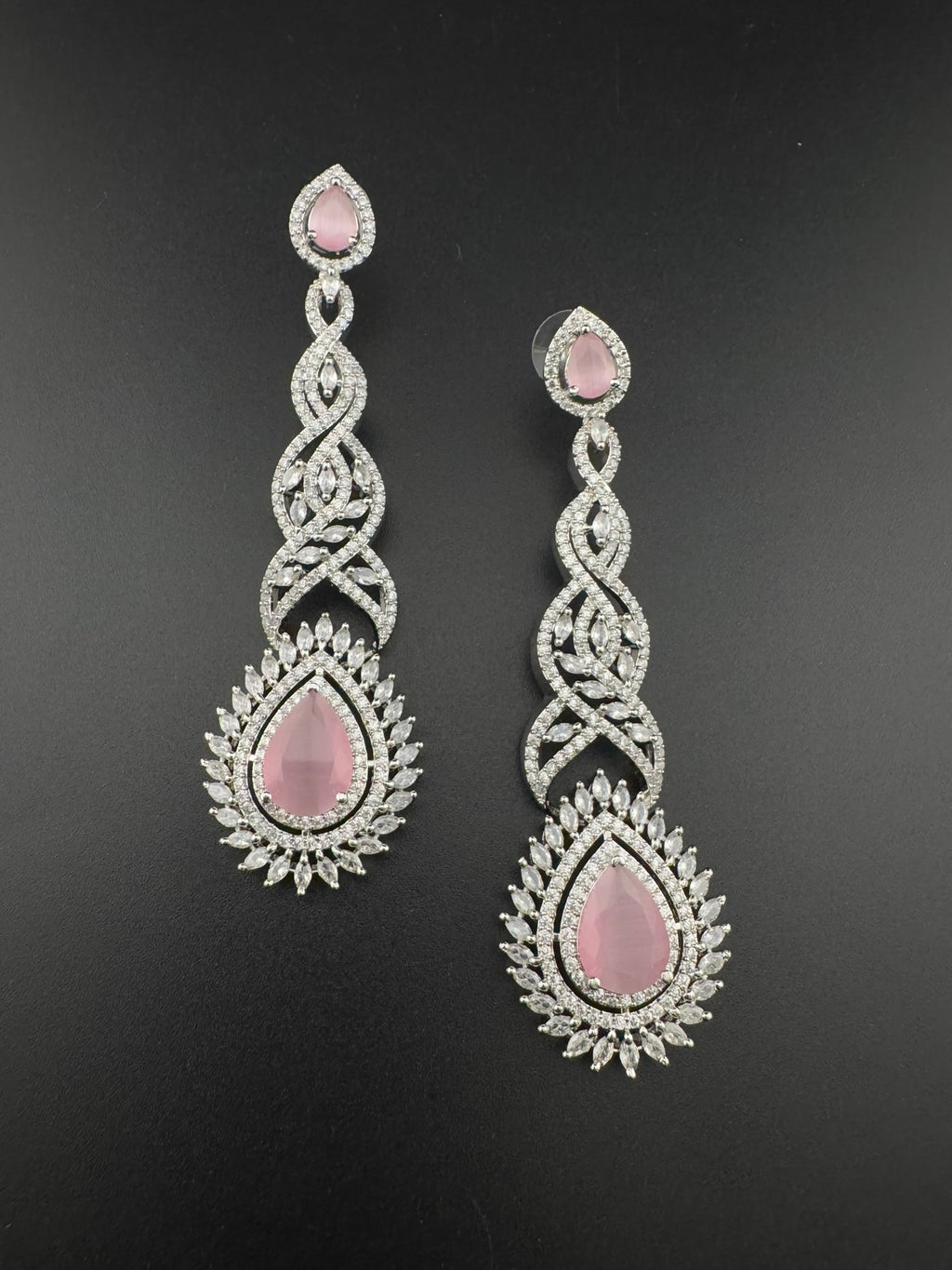 Premium Cubic Zirconia and Crystal stone in silver color is designer Inspired Statement Long earrings