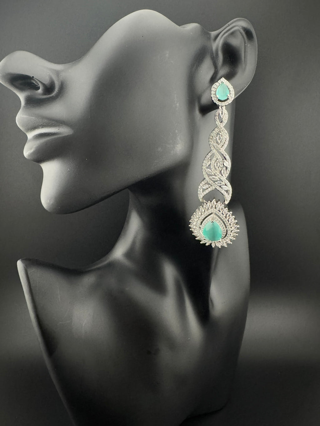 Premium Cubic Zirconia and Crystal stone in silver color is designer Inspired Statement Long earrings