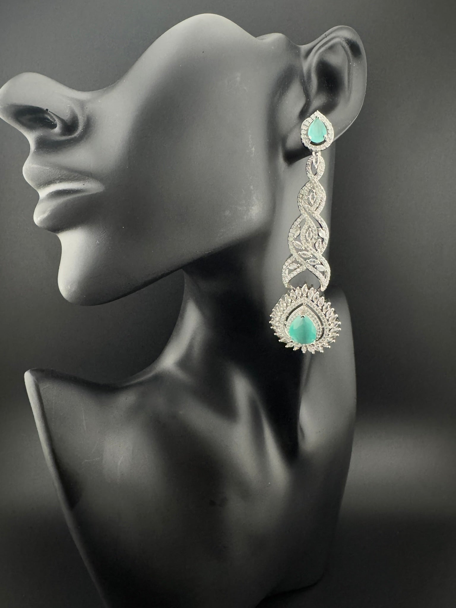 Premium Cubic Zirconia and Crystal stone in silver color is designer Inspired Statement Long earrings