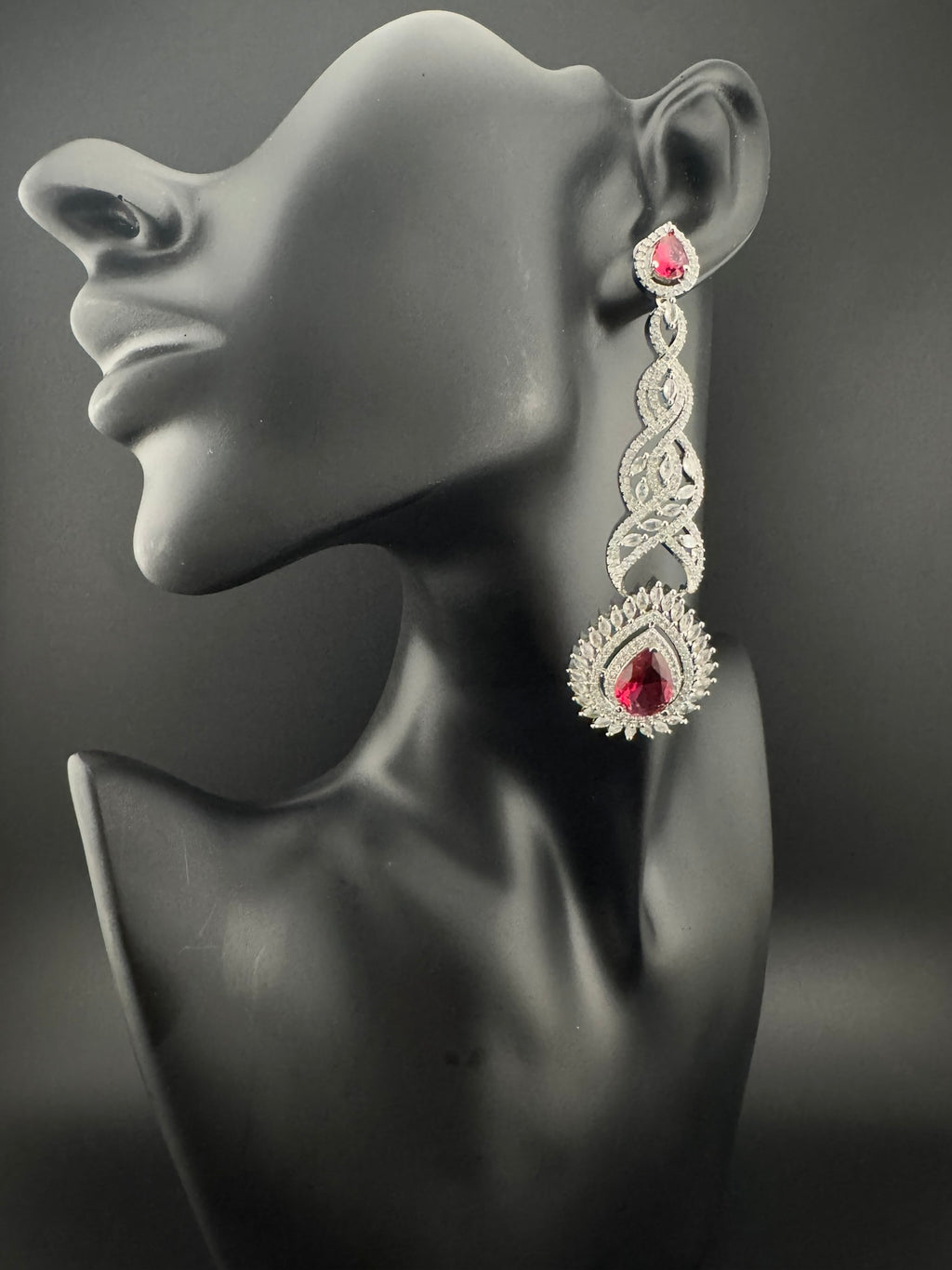 Premium Cubic Zirconia and Crystal stone in silver color is designer Inspired Statement Long earrings