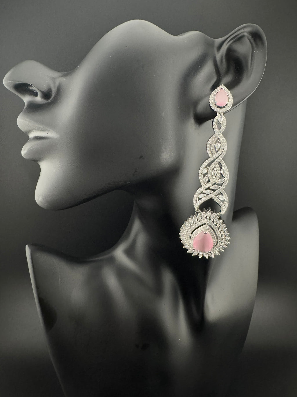 Premium Cubic Zirconia and Crystal stone in silver color is designer Inspired Statement Long earrings