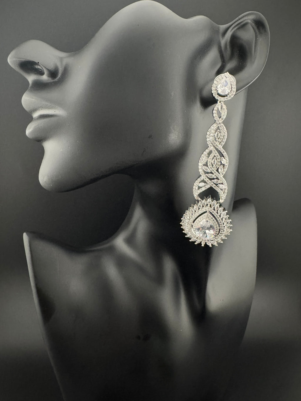 Premium Cubic Zirconia and Crystal stone in silver color is designer Inspired Statement Long earrings