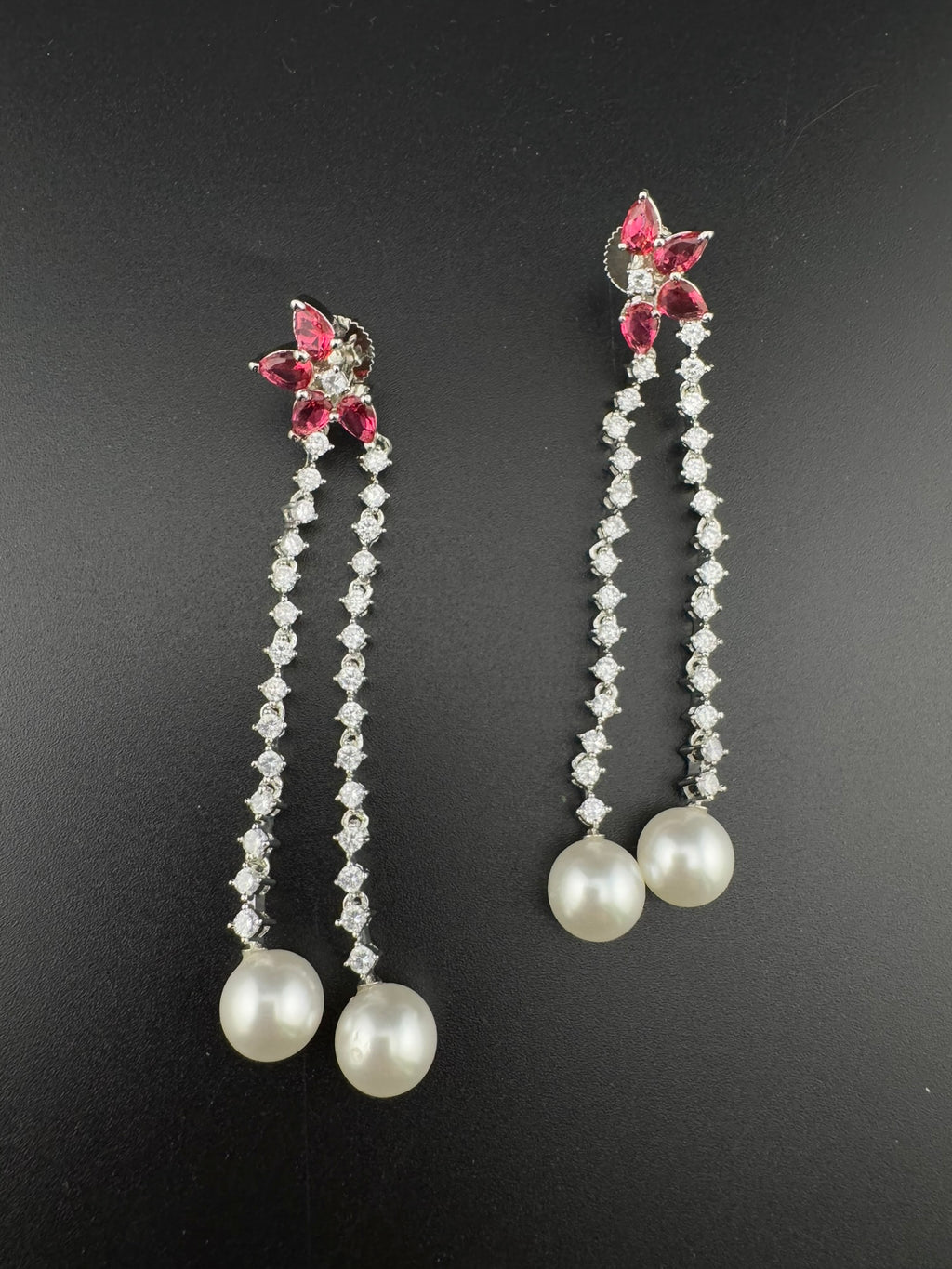 Premium silver color Cubic Zirconia Dangle long earrings with Crystal and Pearls is designer Statement long earrings