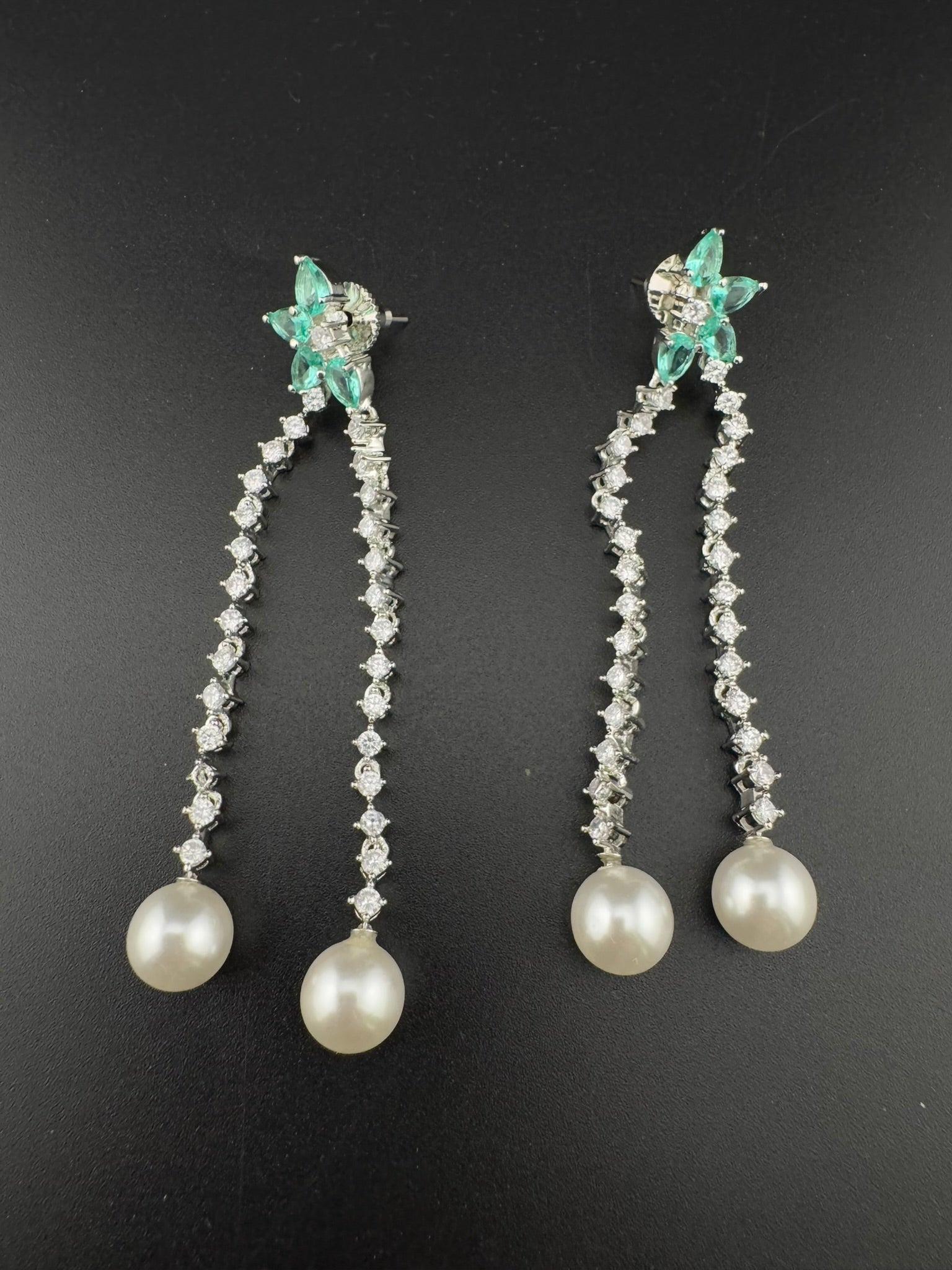 Premium silver color Cubic Zirconia Dangle long earrings with Crystal and Pearls is designer Statement long earrings