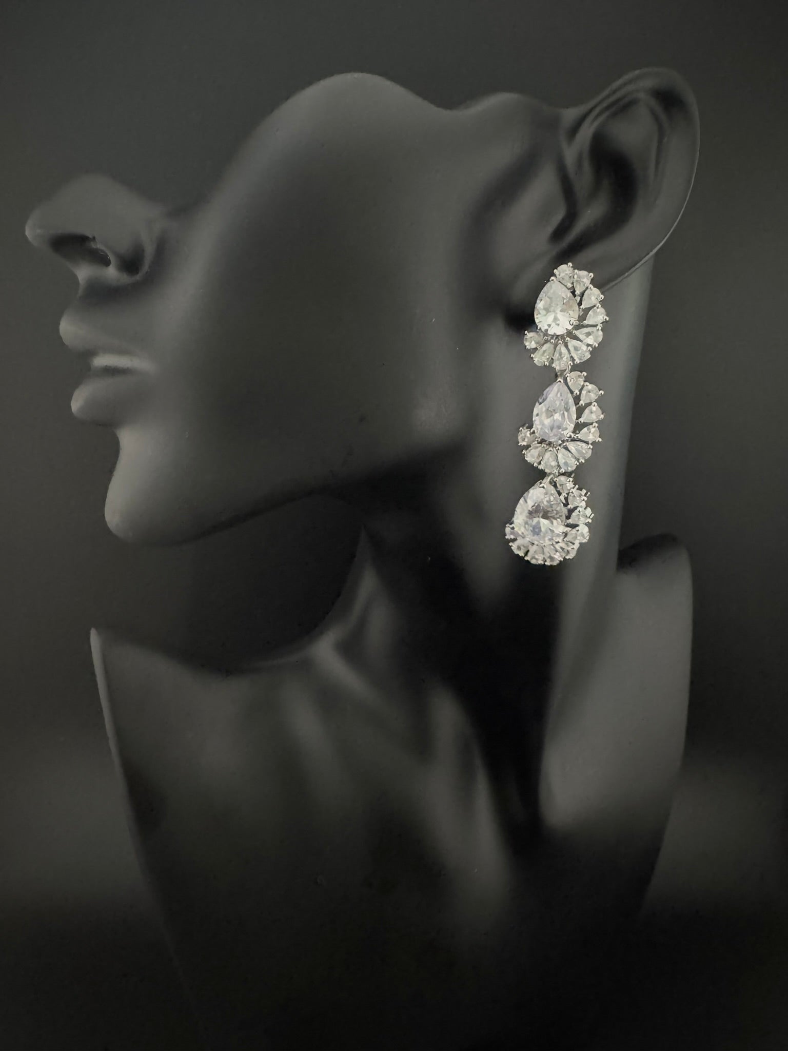 Premium Cubic Zirconia and Crystal stone in silver color Statement Long earrings