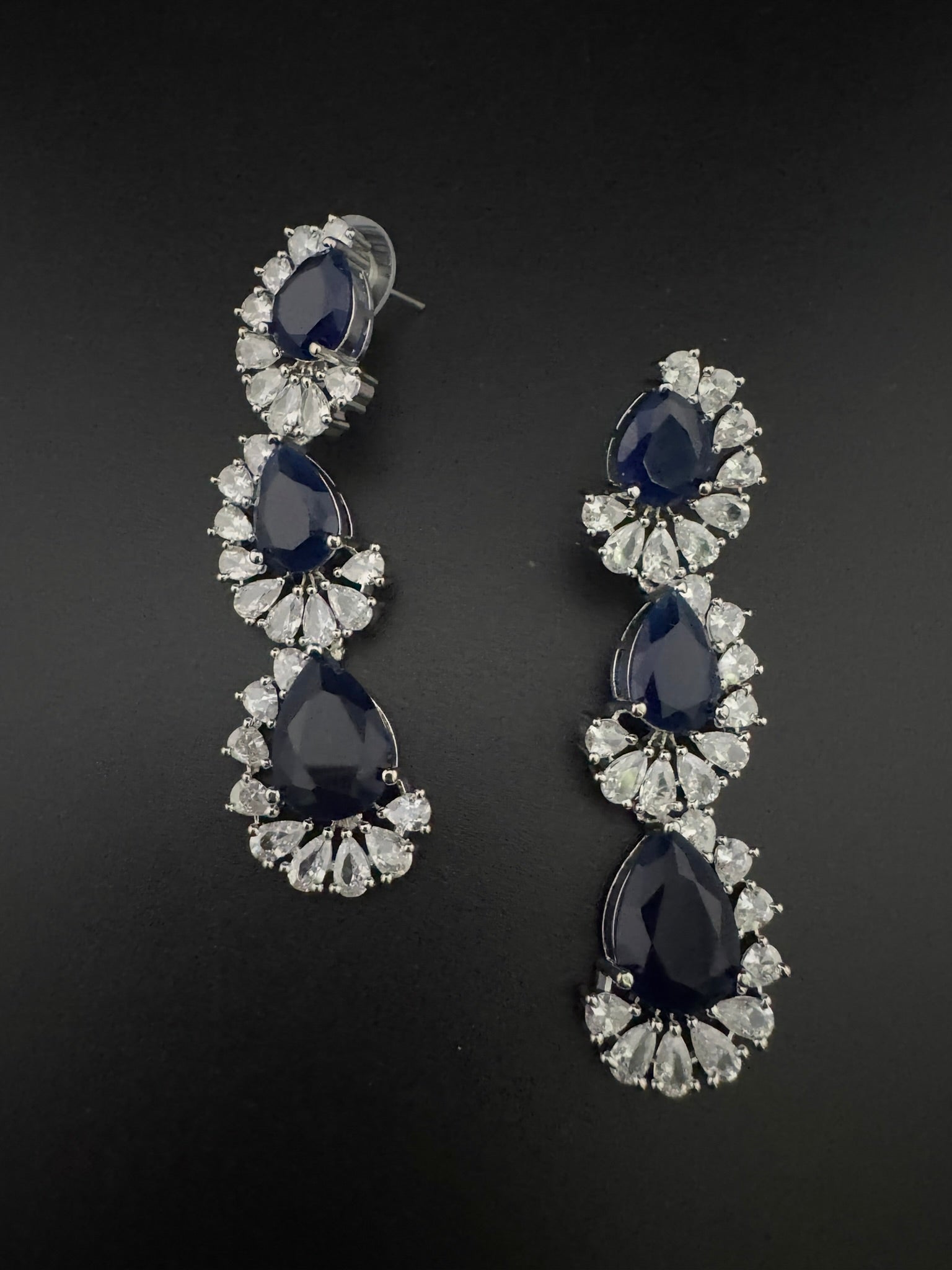 Premium Cubic Zirconia and Crystal stone in silver color Statement Long earrings