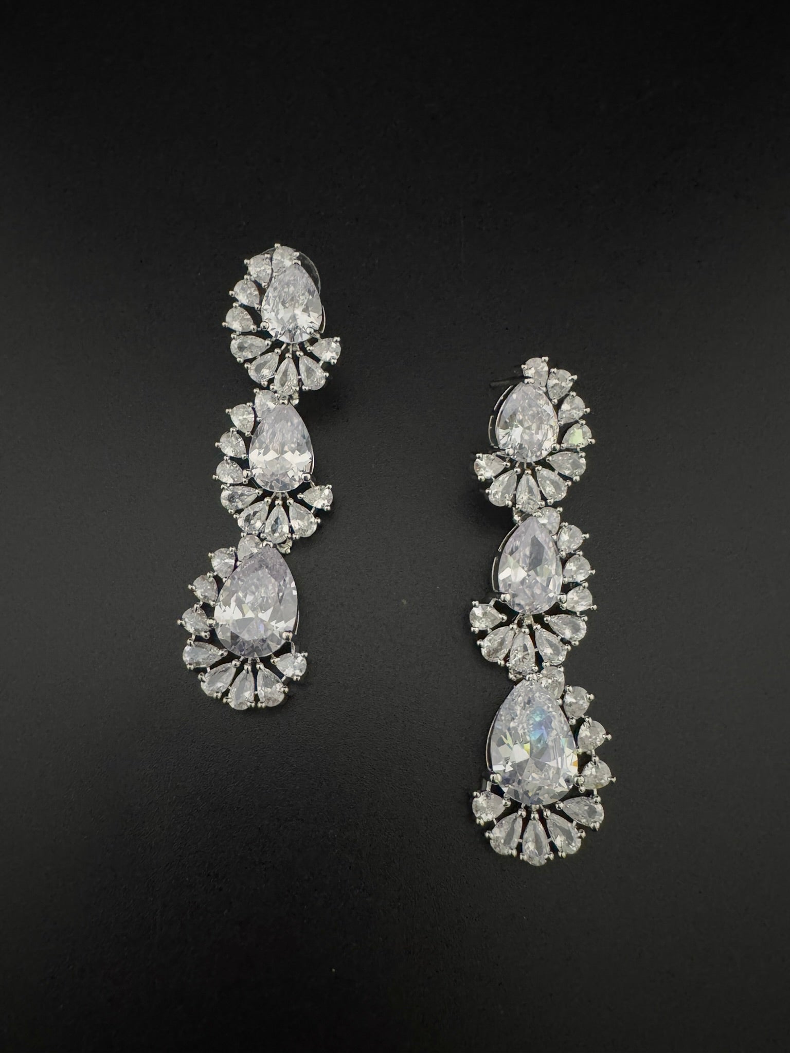 Premium Cubic Zirconia and Crystal stone in silver color Statement Long earrings