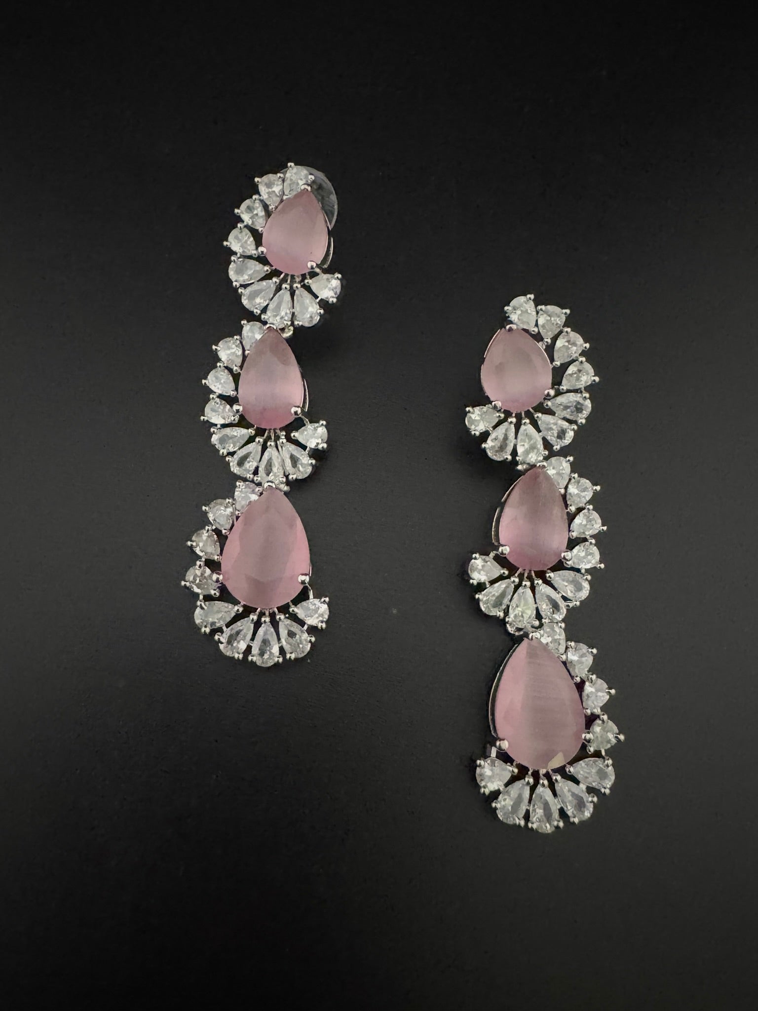 Premium Cubic Zirconia and Crystal stone in silver color Statement Long earrings