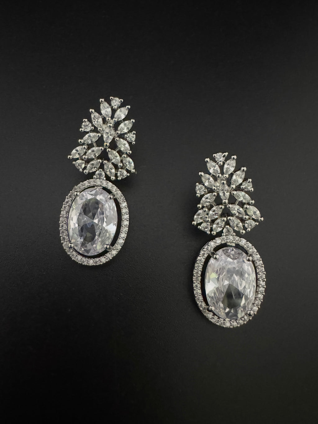 Premium Cubic Zirconia and Crystal stones in silver color earrings