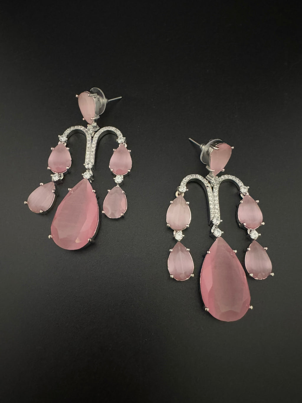 Premium Cubic Zirconia and glass stone in silver color is designer Inspired Statement Long earrings