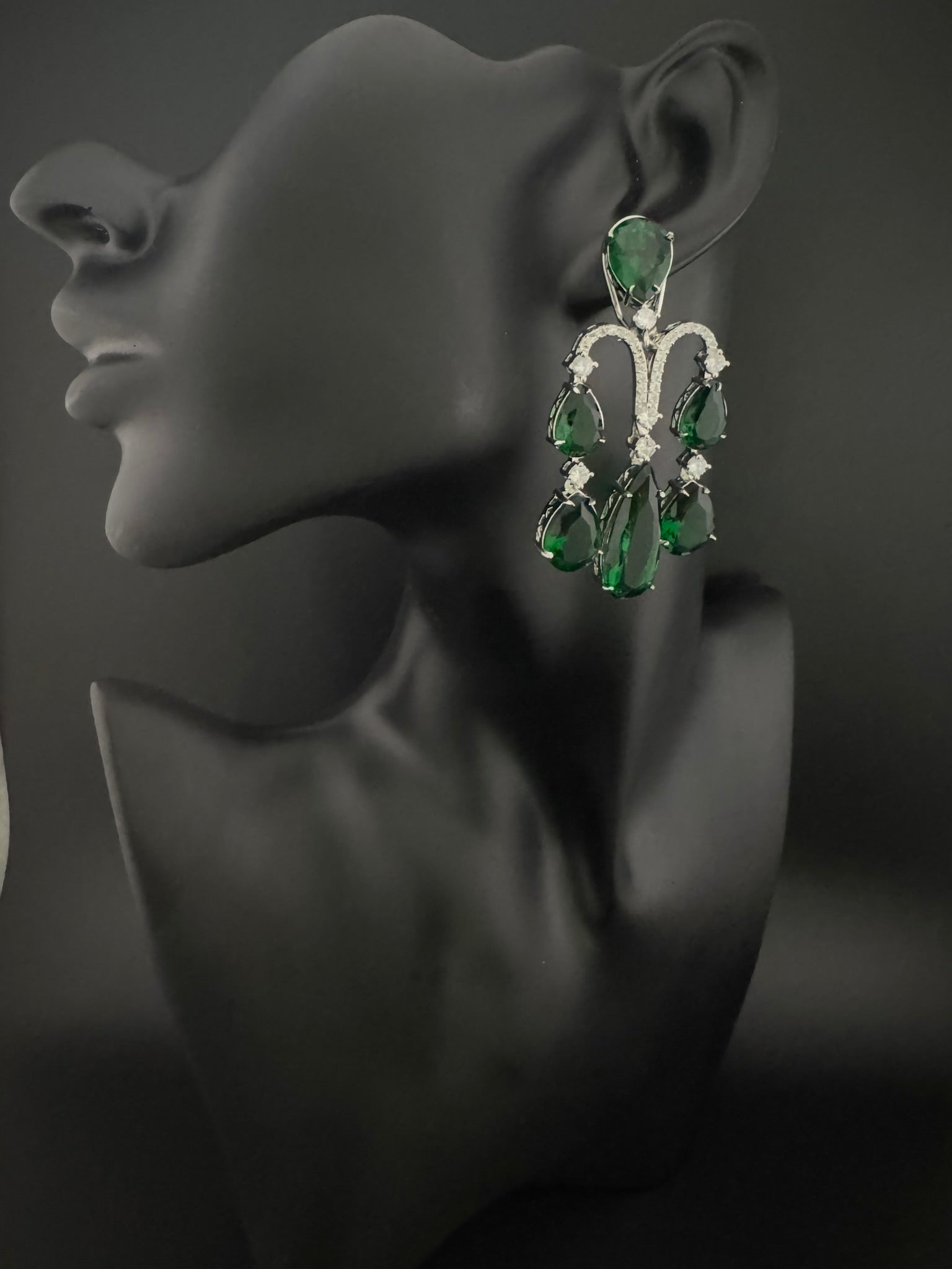 Premium Cubic Zirconia and glass stone in silver color is designer Inspired Statement Long earrings