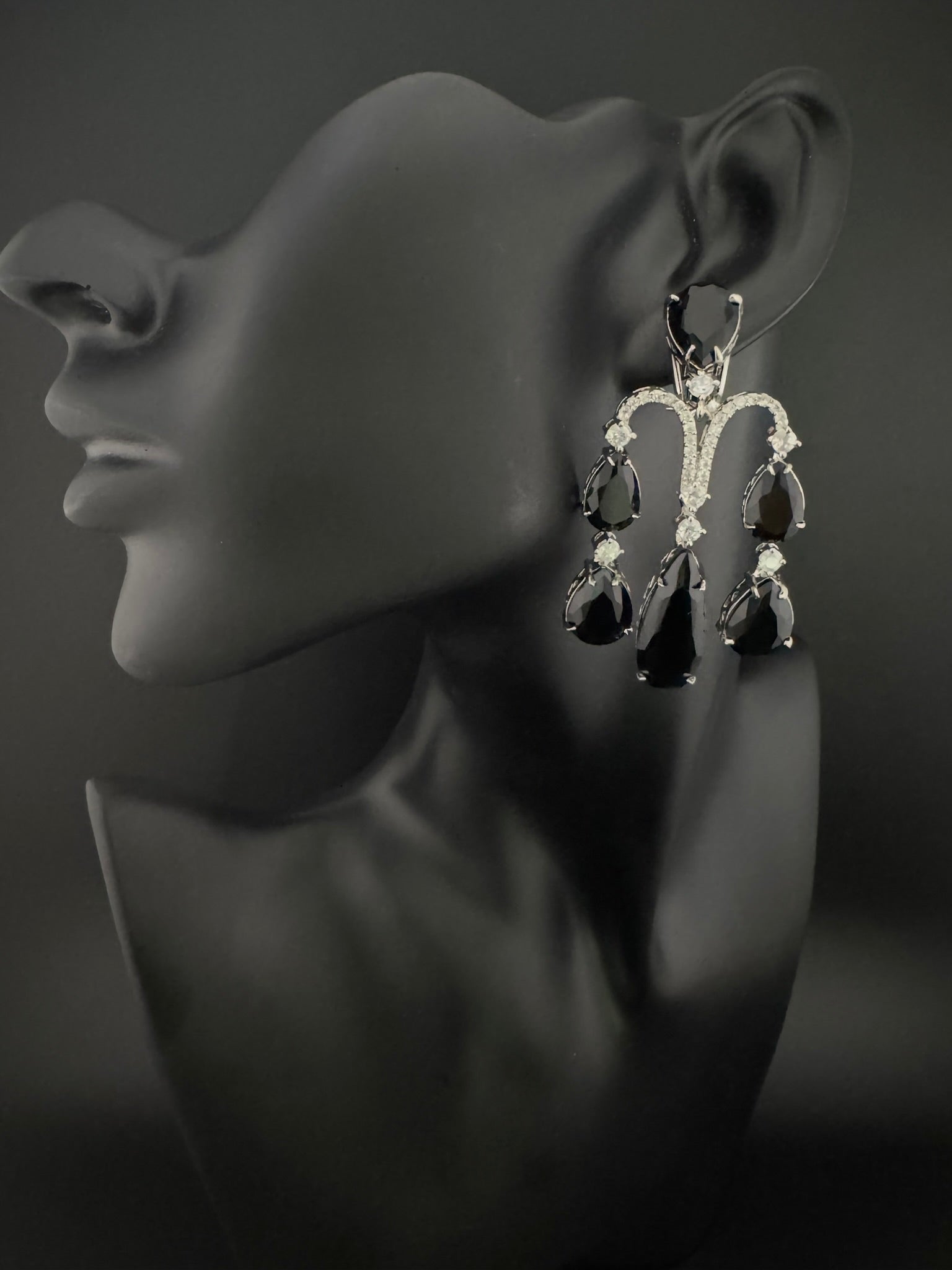 Premium Cubic Zirconia and glass stone in silver color is designer Inspired Statement Long earrings