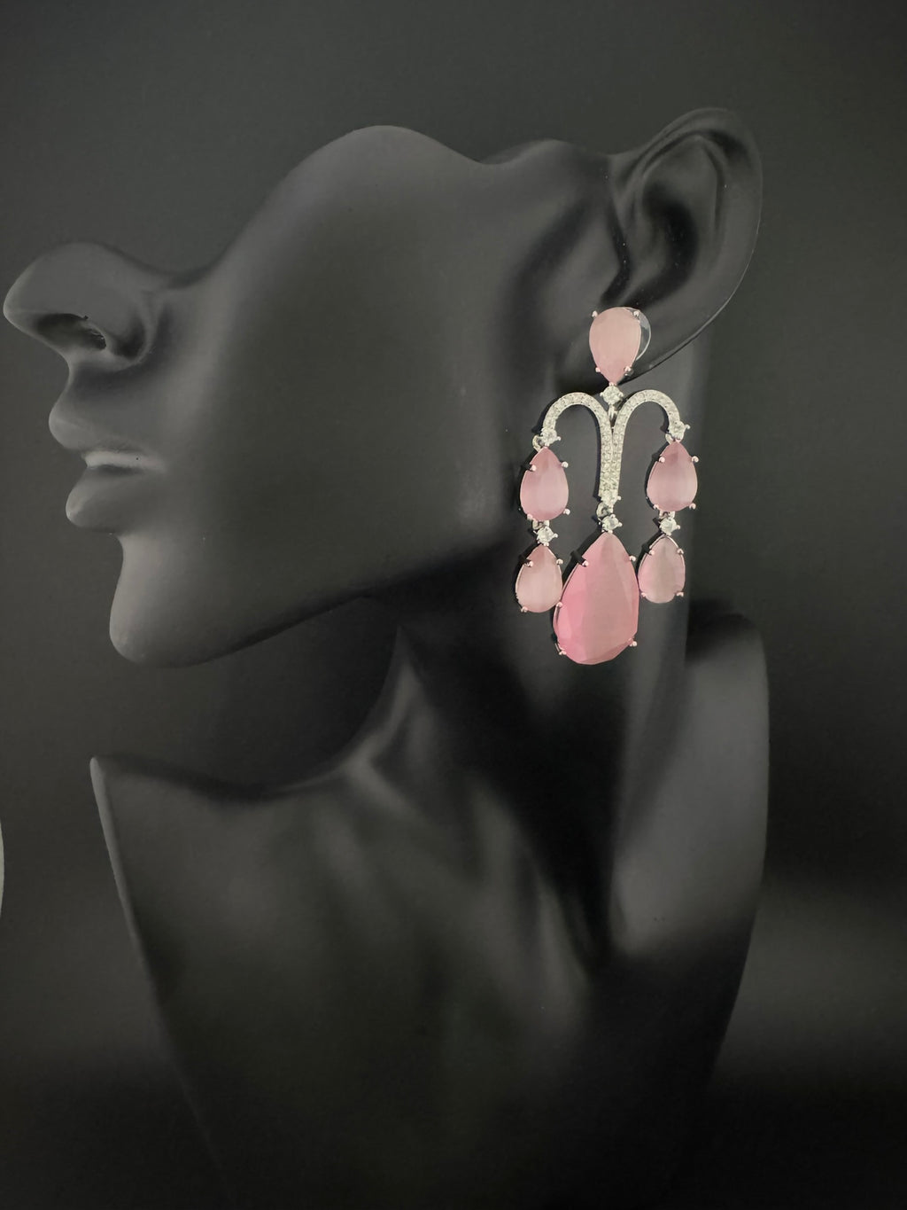 Premium Cubic Zirconia and glass stone in silver color is designer Inspired Statement Long earrings