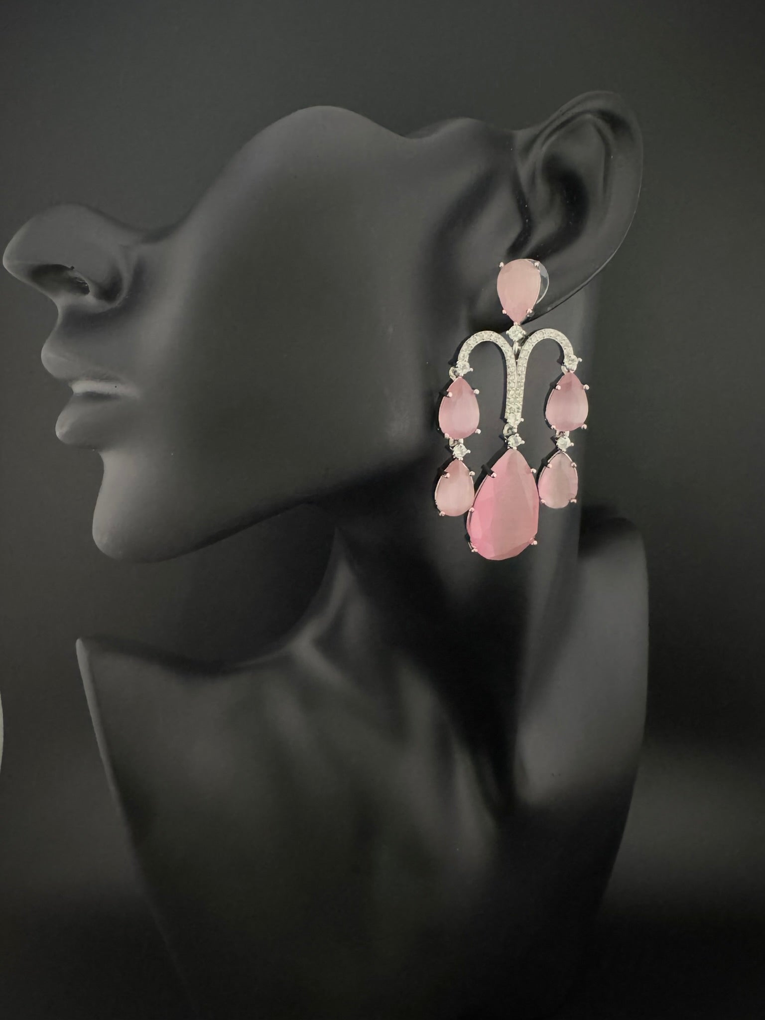 Premium Cubic Zirconia and glass stone in silver color is designer Inspired Statement Long earrings