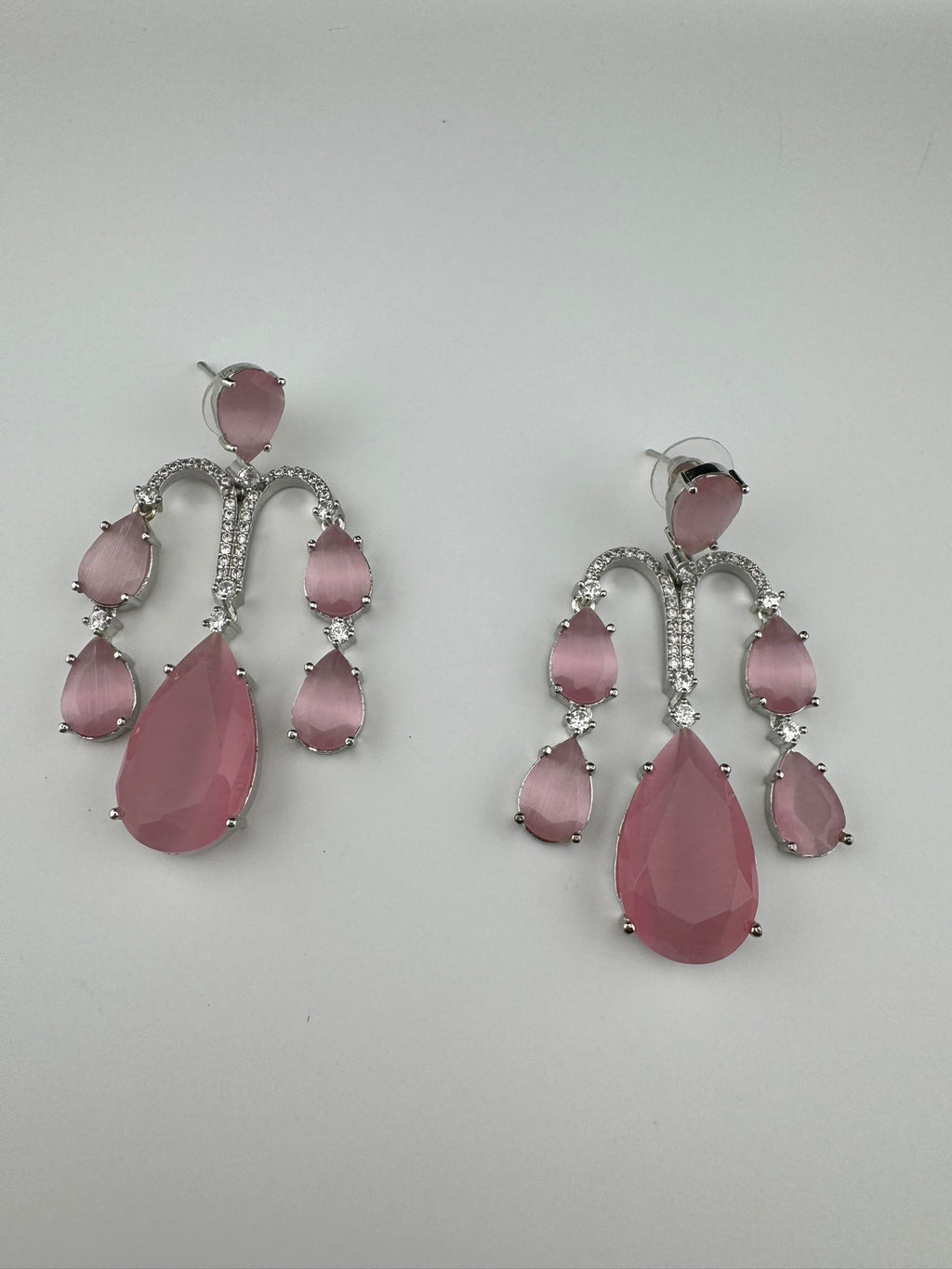 Premium Cubic Zirconia and glass stone in silver color is designer Inspired Statement Long earrings