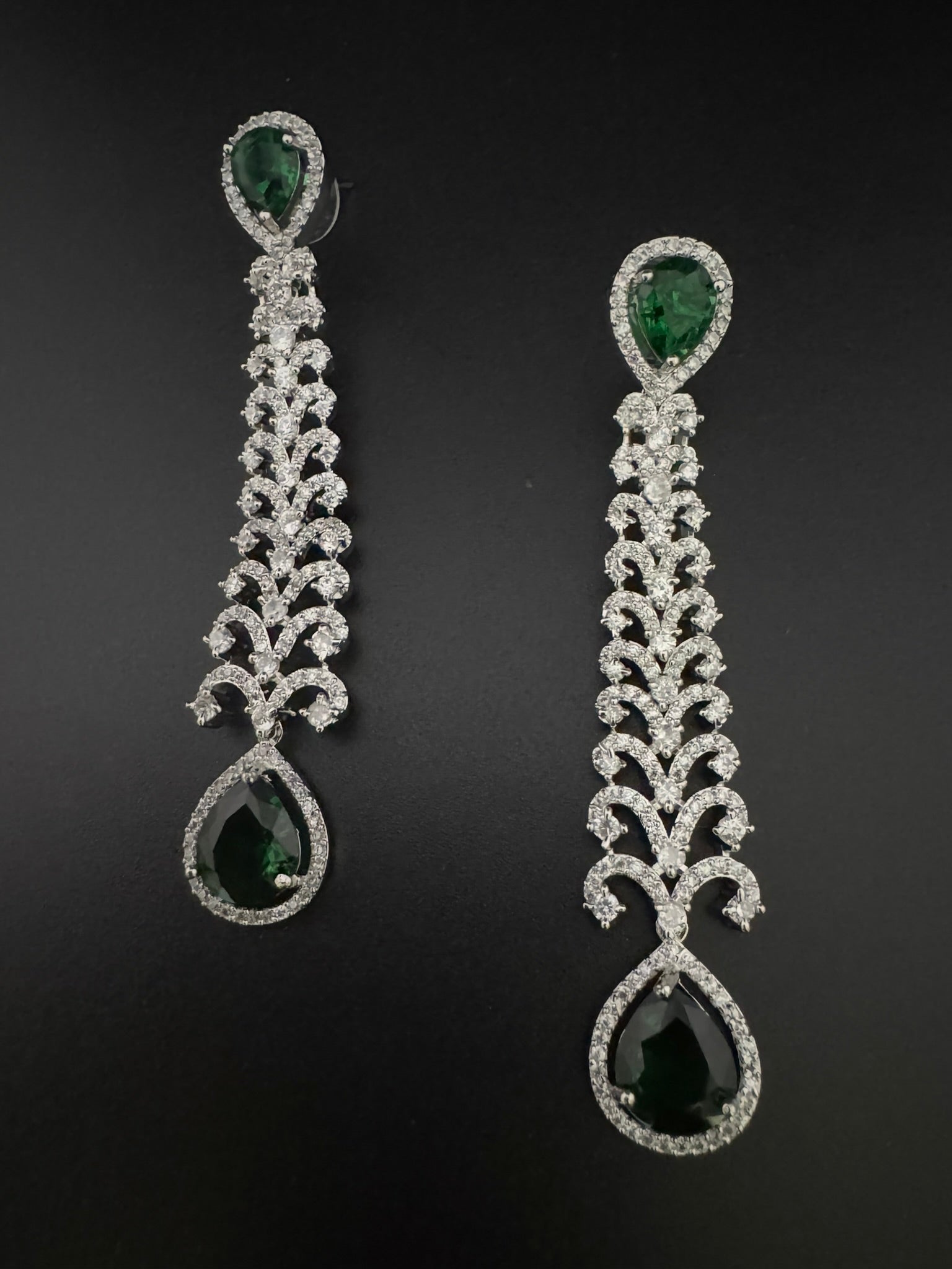 Premium Cubic Zirconia and Crystal stone in silver color is designer Inspired Statement Long earrings