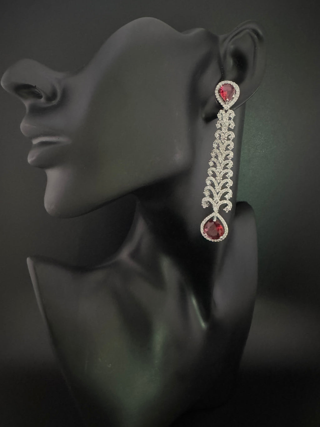 Premium Cubic Zirconia and Crystal stone in silver color is designer Inspired Statement Long earrings