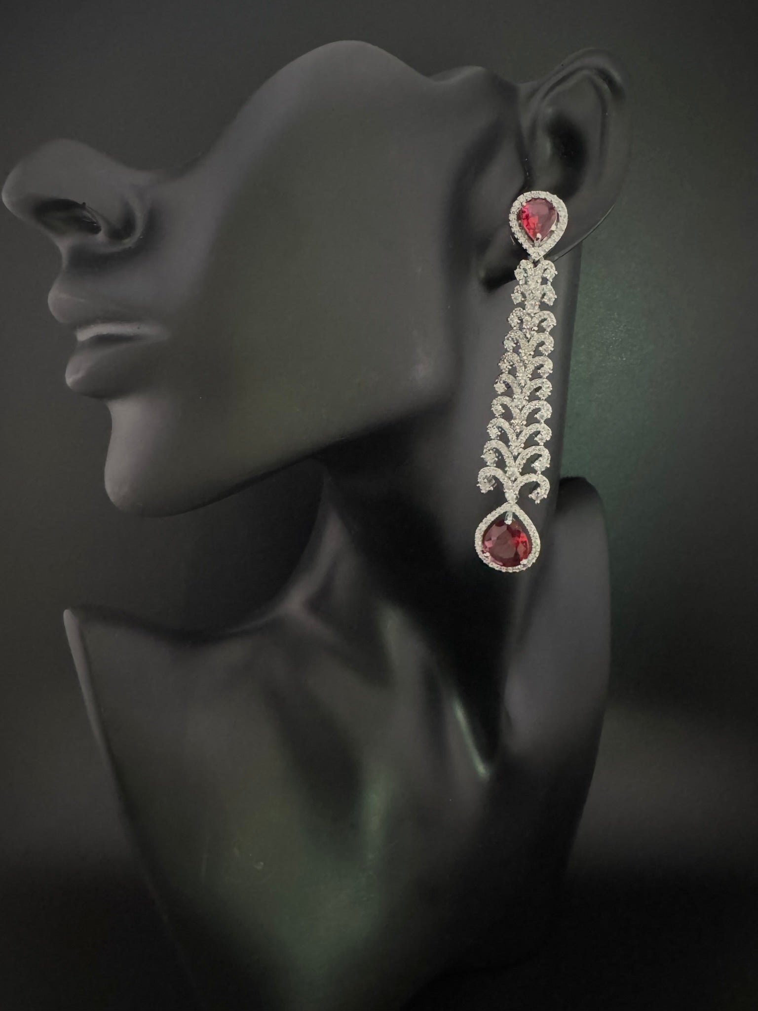 Premium Cubic Zirconia and Crystal stone in silver color is designer Inspired Statement Long earrings