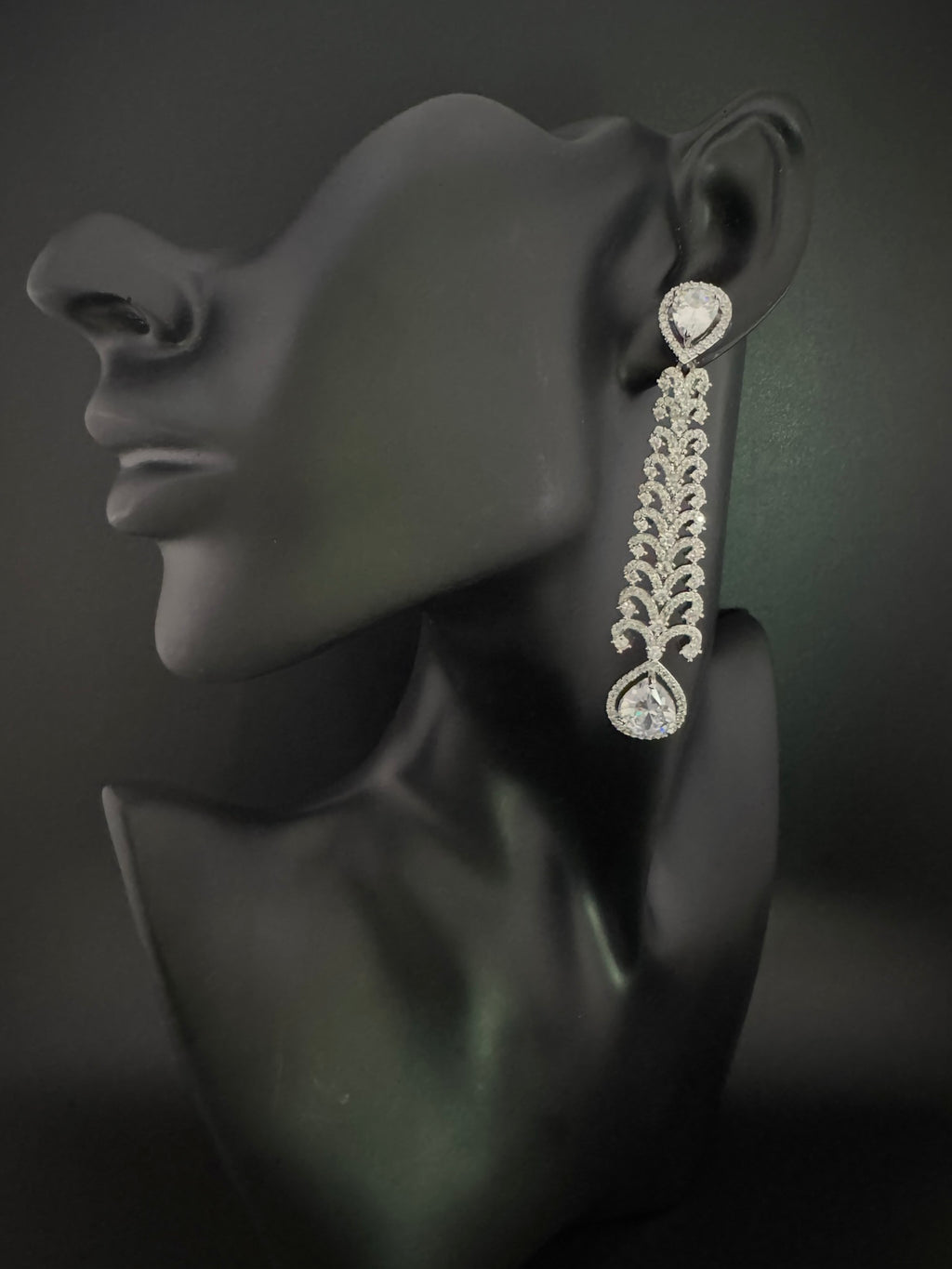 Premium Cubic Zirconia and Crystal stone in silver color is designer Inspired Statement Long earrings
