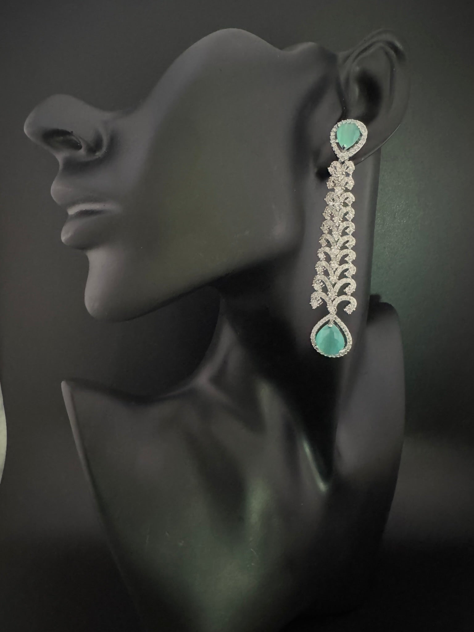 Premium Cubic Zirconia and Crystal stone in silver color is designer Inspired Statement Long earrings