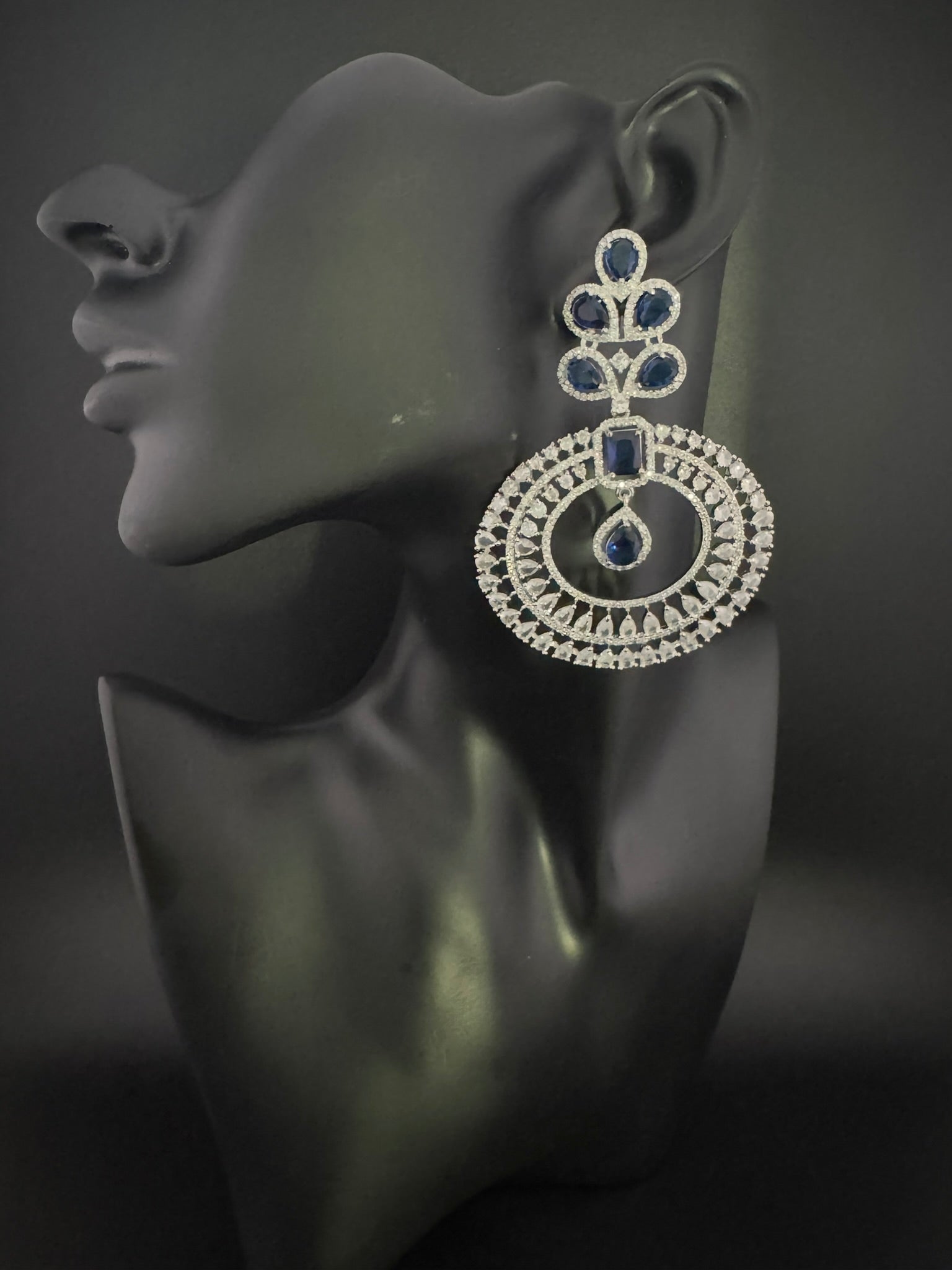 Premium Cubic Zirconia Oversized Chandelier earrings in stones in silver color is designer Inspired Long Statement earrings