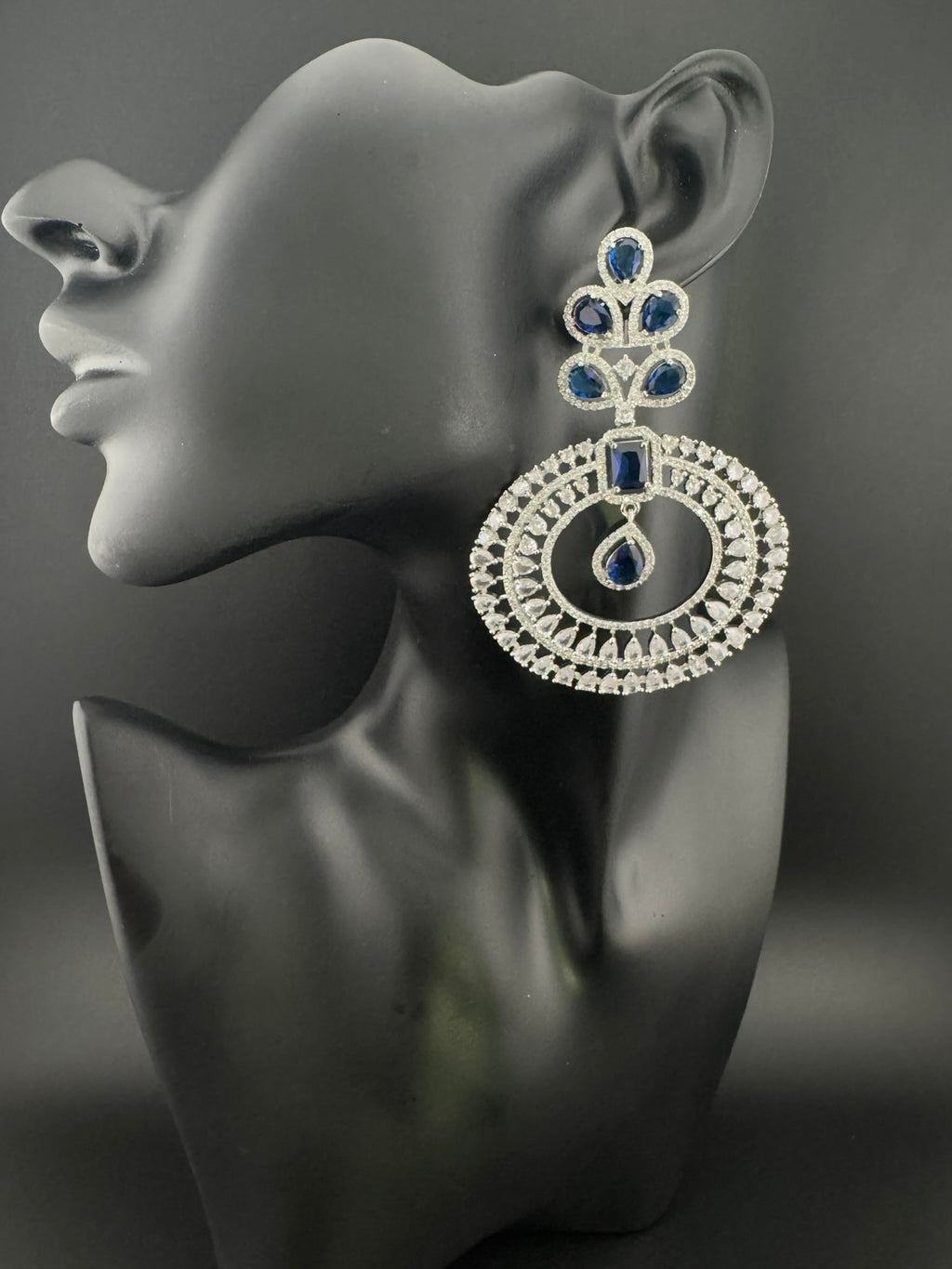 Premium Cubic Zirconia Oversized Chandelier earrings in stones in silver color is designer Inspired Long Statement earrings